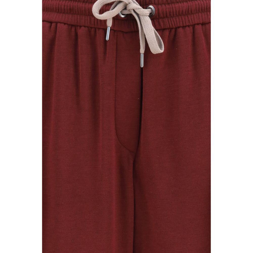 Track Pants by Brunello Cucinelli for women in polyamide silk & cotton bordeaux features an sporty straight-leg, athletic, relaxed-fit & regular-fit with a long and , expertly finished with for an sporty look.
