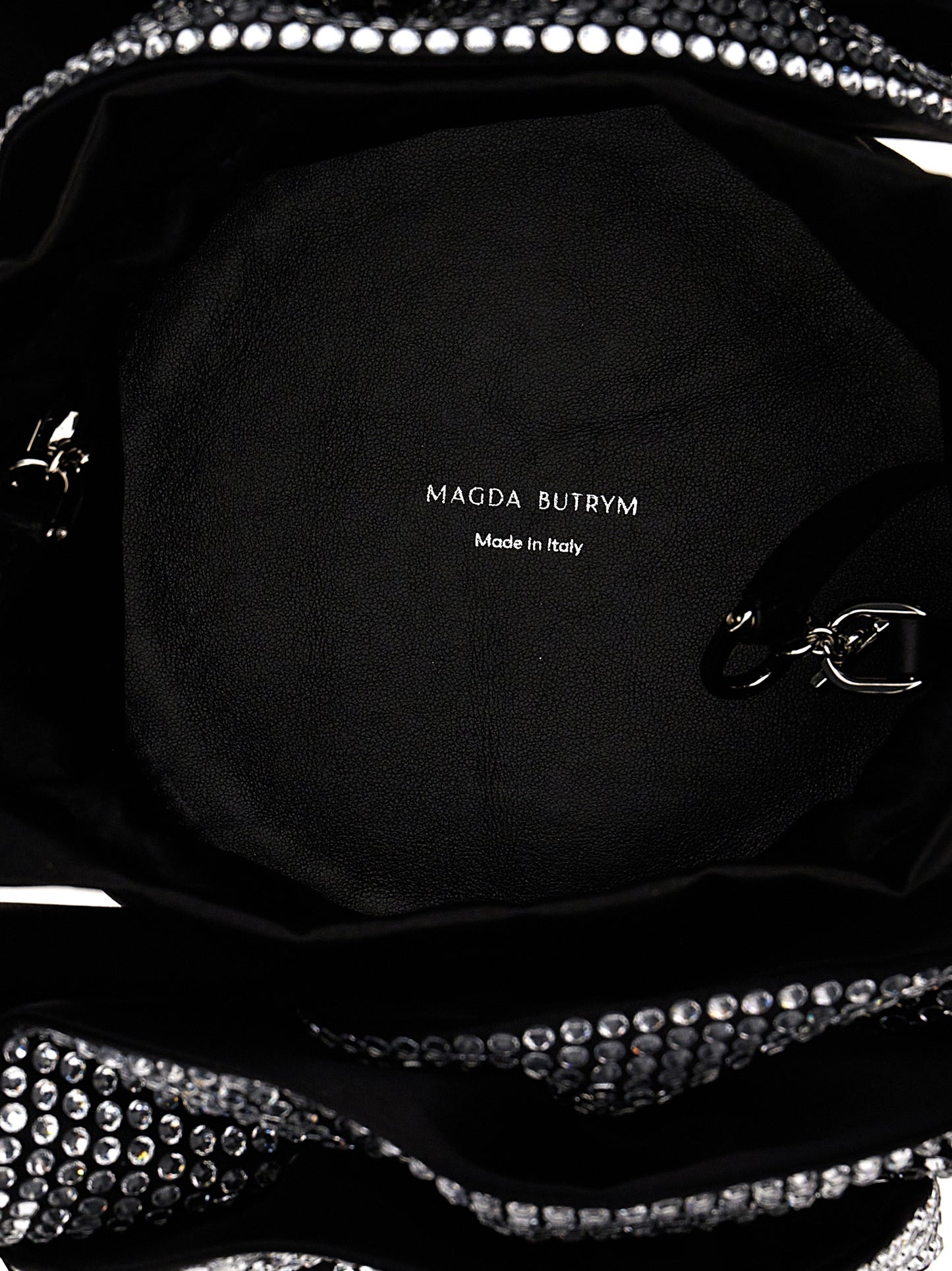 Crossbody Drawstring Handbag by Magda Butrym for women in leather & satin black features a transformative sophistication silhouette, showcasing a secure drawstring, ample , and versatile crossbody-strap, shoulder-strap & adjustable-strap for a transformative sophistication look.
