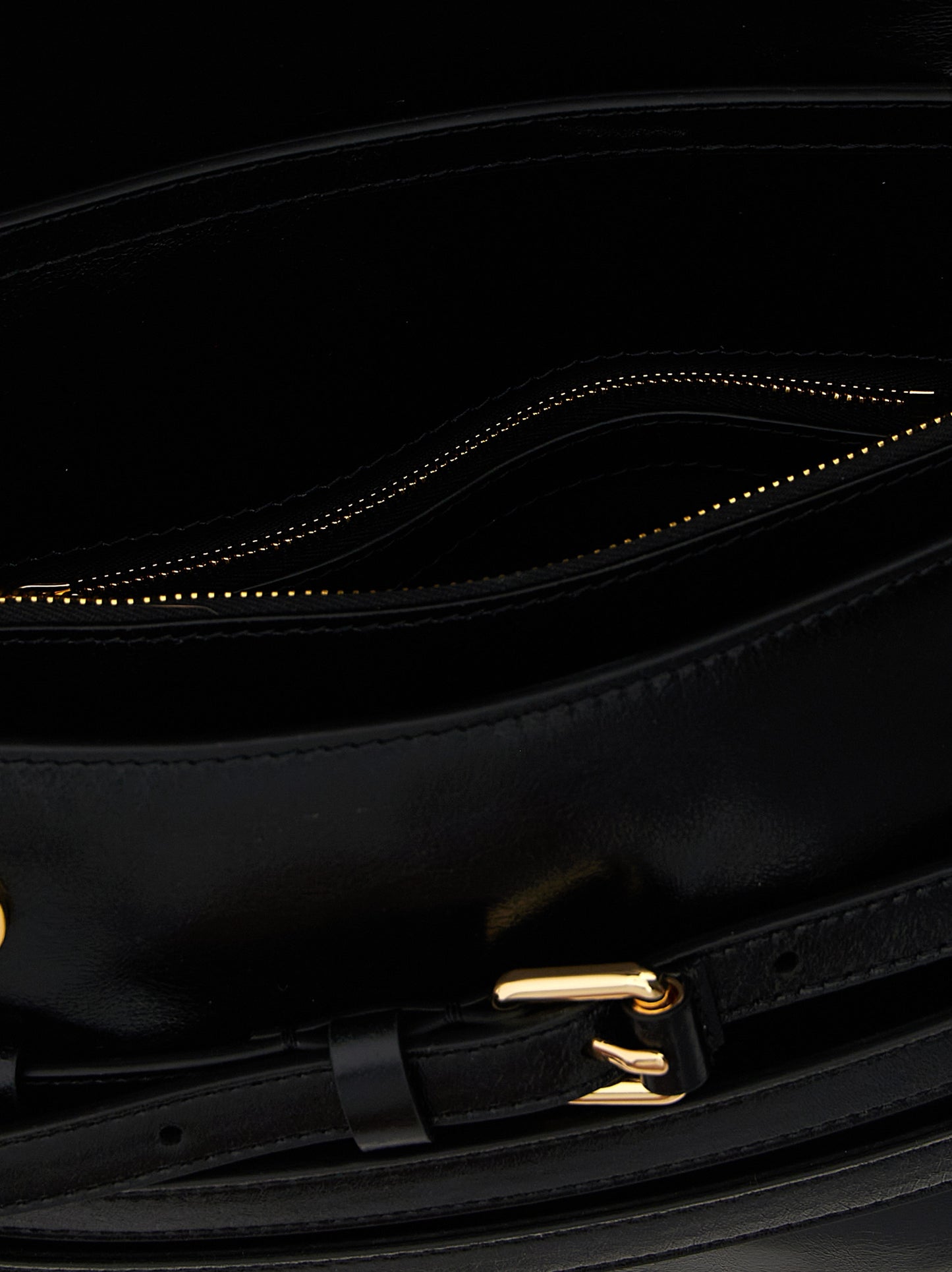Crossbody Flap Handbag by Moschino for women in leather black features a transformative sophistication silhouette, showcasing a secure flap & magnetic, ample , and versatile crossbody-strap, shoulder-strap, adjustable-strap & belt-strap for a transformative sophistication look.