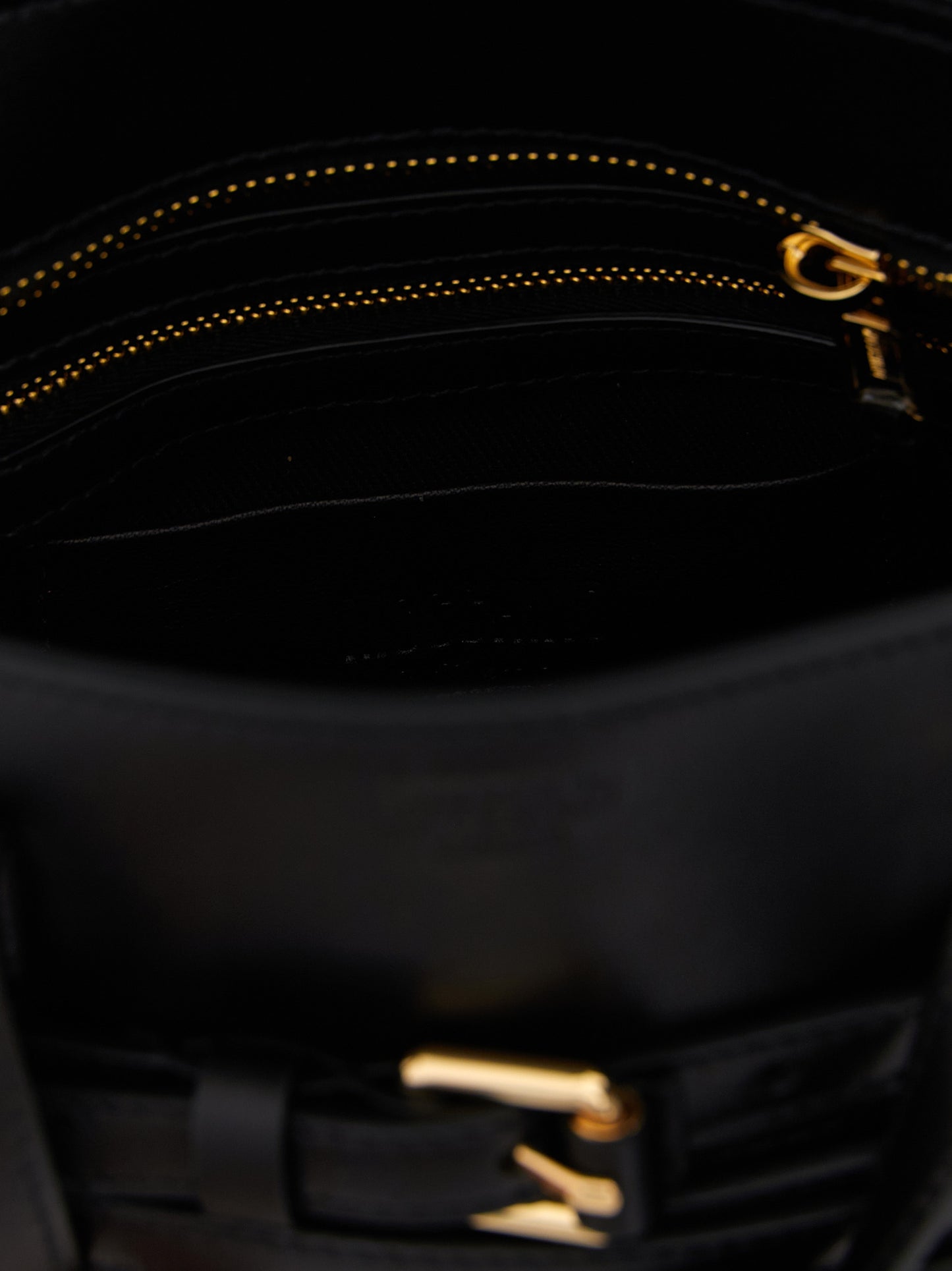 Small Handbag by Moschino for women in polyester leather black features a signature silhouette, showcasing a secure zipper and signature with versatile shoulder-strap, adjustable-strap, belt-strap & handle for a sophisticated look.