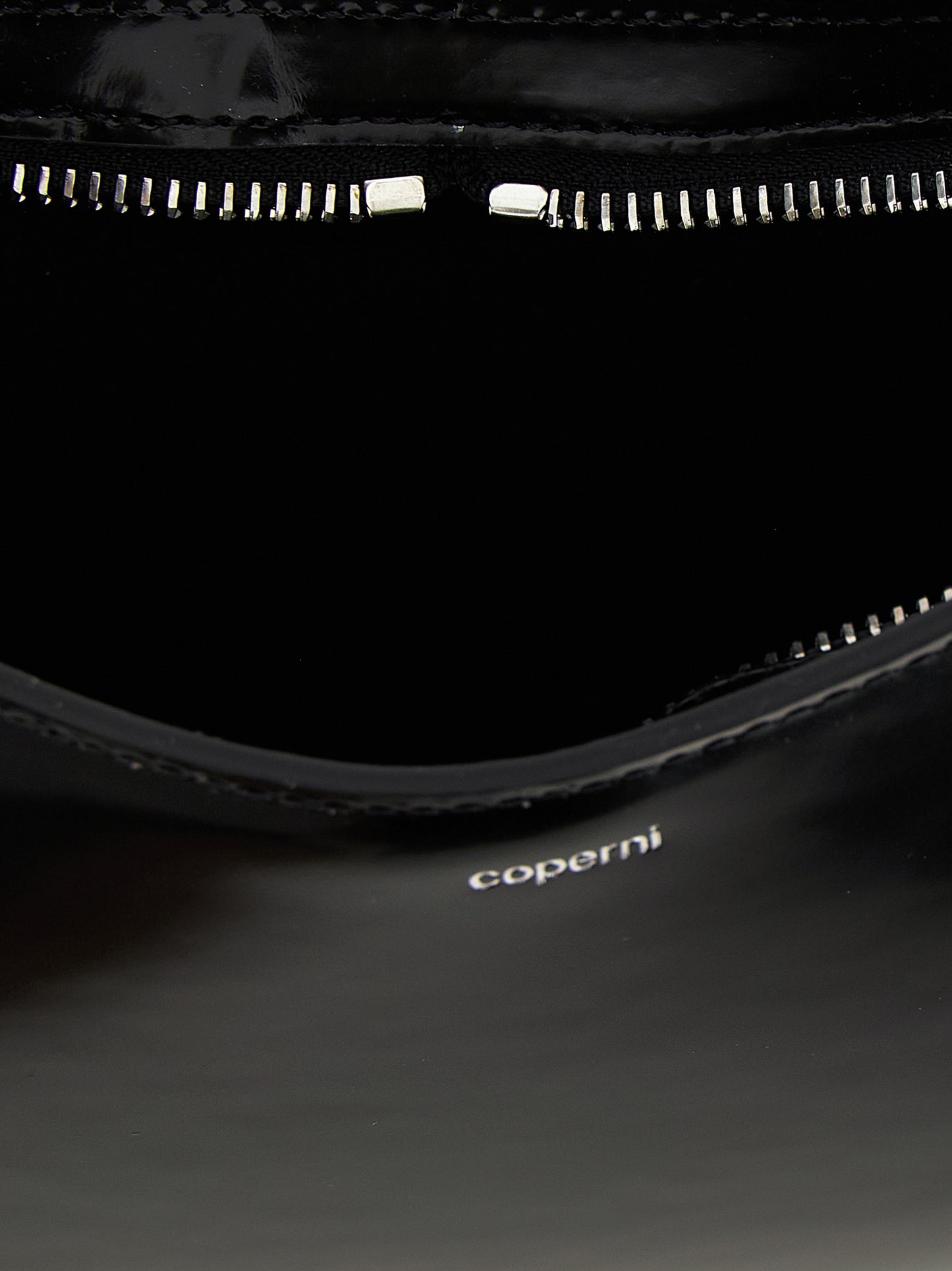Handbag by Coperni for women in leather black features a exquisite silhouette, showcasing a secure zipper and exquisite with versatile handle for a exquisite finish.