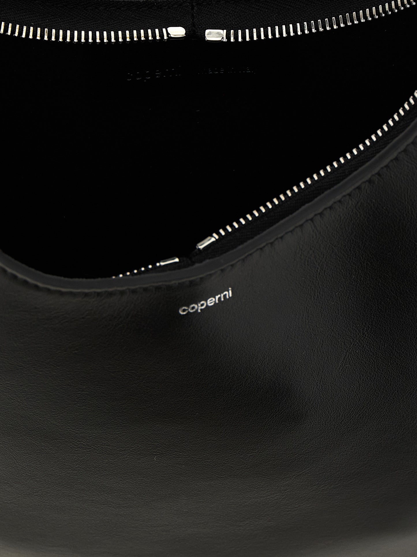 Medium Shoulder Bag by Coperni for women in bos taurus calf suede leather black features an effortlessly chic silhouette with a secure zipper, ample , and versatile shoulder-strap for effortlessly chic everyday luxury.