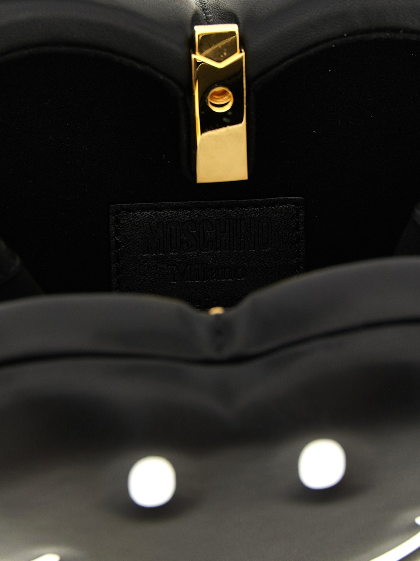 Handbag by Moschino for women in foam black features a exquisite silhouette, showcasing a secure and exquisite with versatile shoulder-strap, adjustable-strap & handle for a exquisite finish.