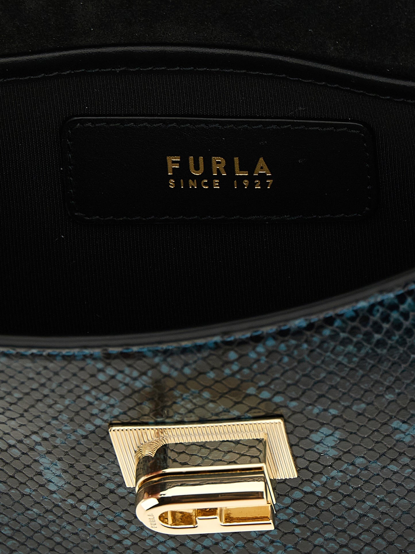 Mini Crossbody Flap Handbag by Furla for women in calfskin leather blue showcases a versatile sophistication silhouette, featuring a secure flap, versatile sophistication , and versatile crossbody-strap & shoulder-strap for a versatile sophistication finish.