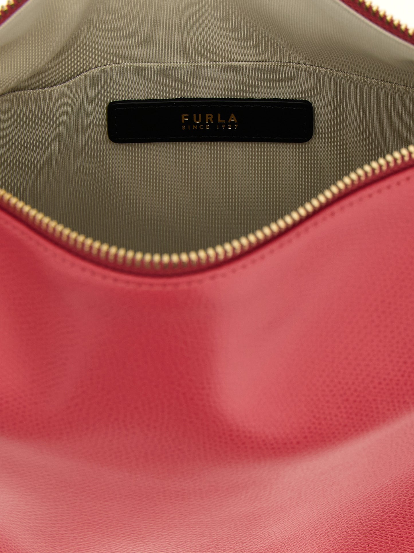 Shoulder Bag by Furla for women in calfskin leather fuchsia, signature & print showcases a statuesque silhouette, artfully detailed with a secure zipper, organized , and versatile shoulder-strap, adjustable-strap, detachable-strap & handle for a statuesque look.