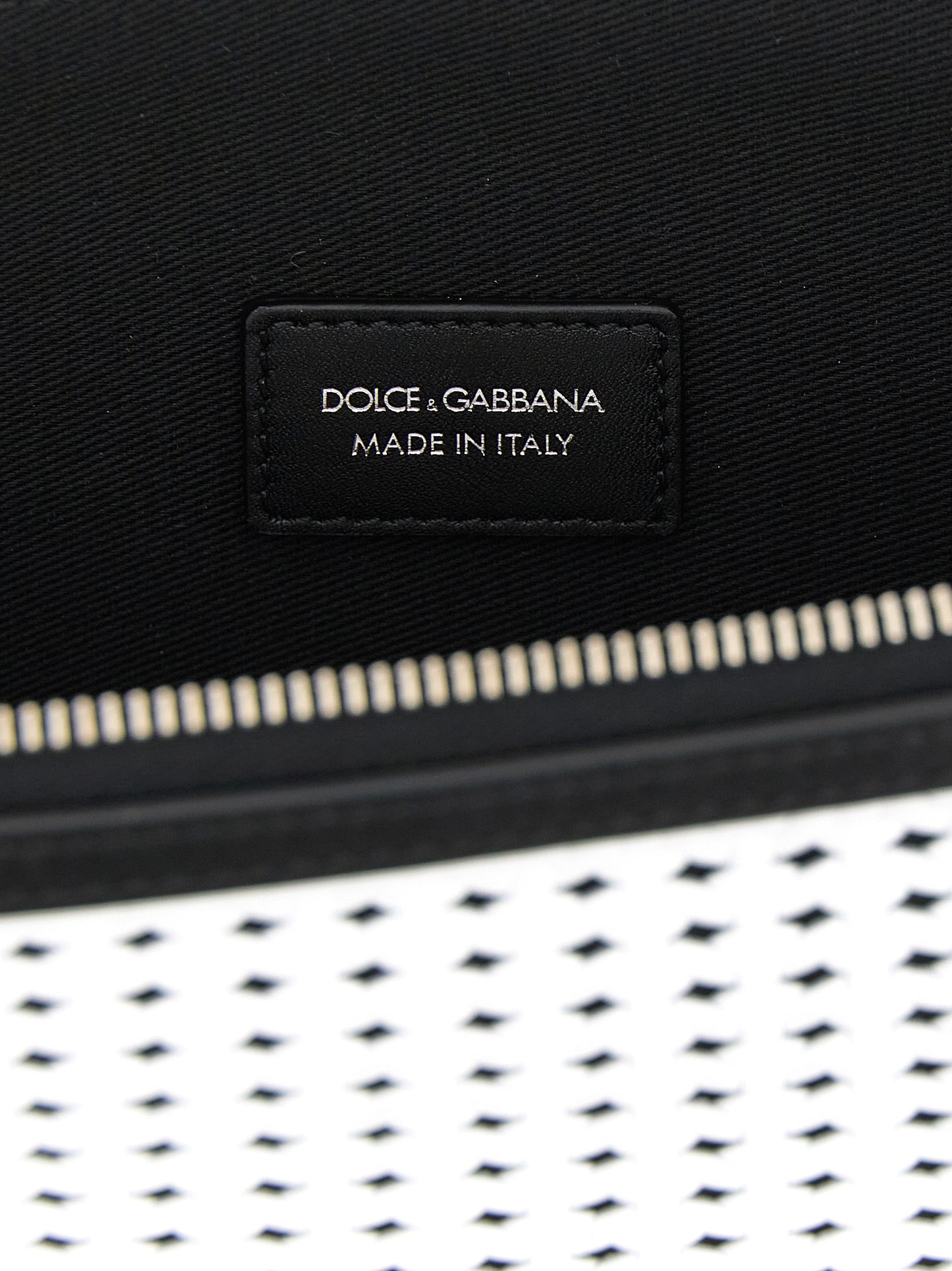 Clutch Handbag by Dolce & Gabbana for unisex in bos taurus calf suede leather bicolour, black, palladium & white showcases a sculptural silhouette, featuring a secure zipper, ample , and versatile handle for a sculptural finish.