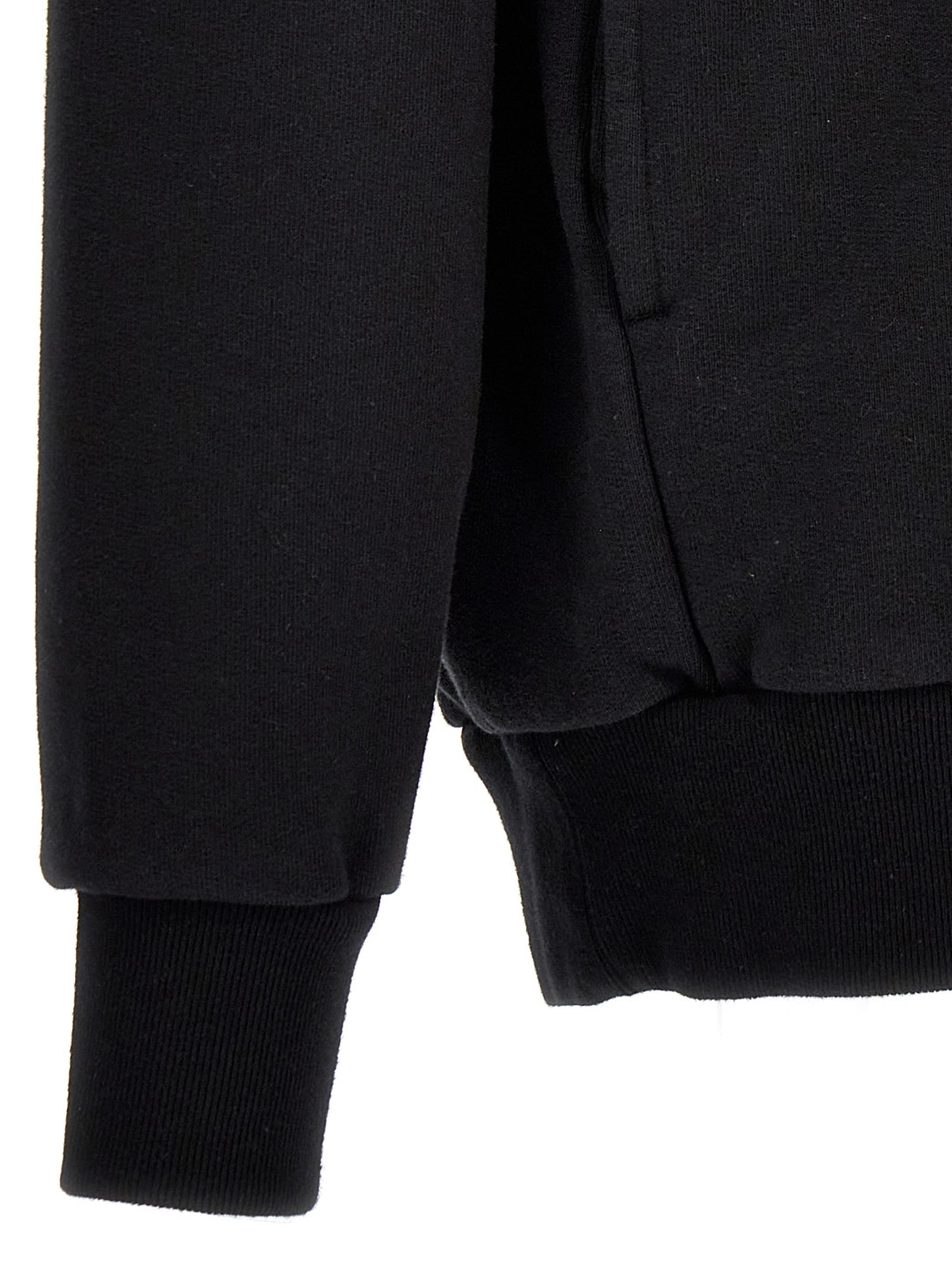 Sweatshirt by Undercover for men in cotton bicolour, black, pink, white & print presents a smart casual silhouette, featuring a smart casual and for a sophisticated look.