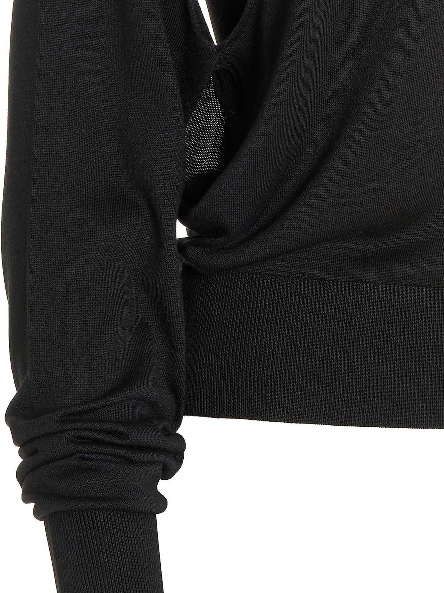 Cardigan by RAMAEL for women in silk black showcases a captivating silhouette, artfully detailed with a captivating and for a truly sophisticated captivating look.