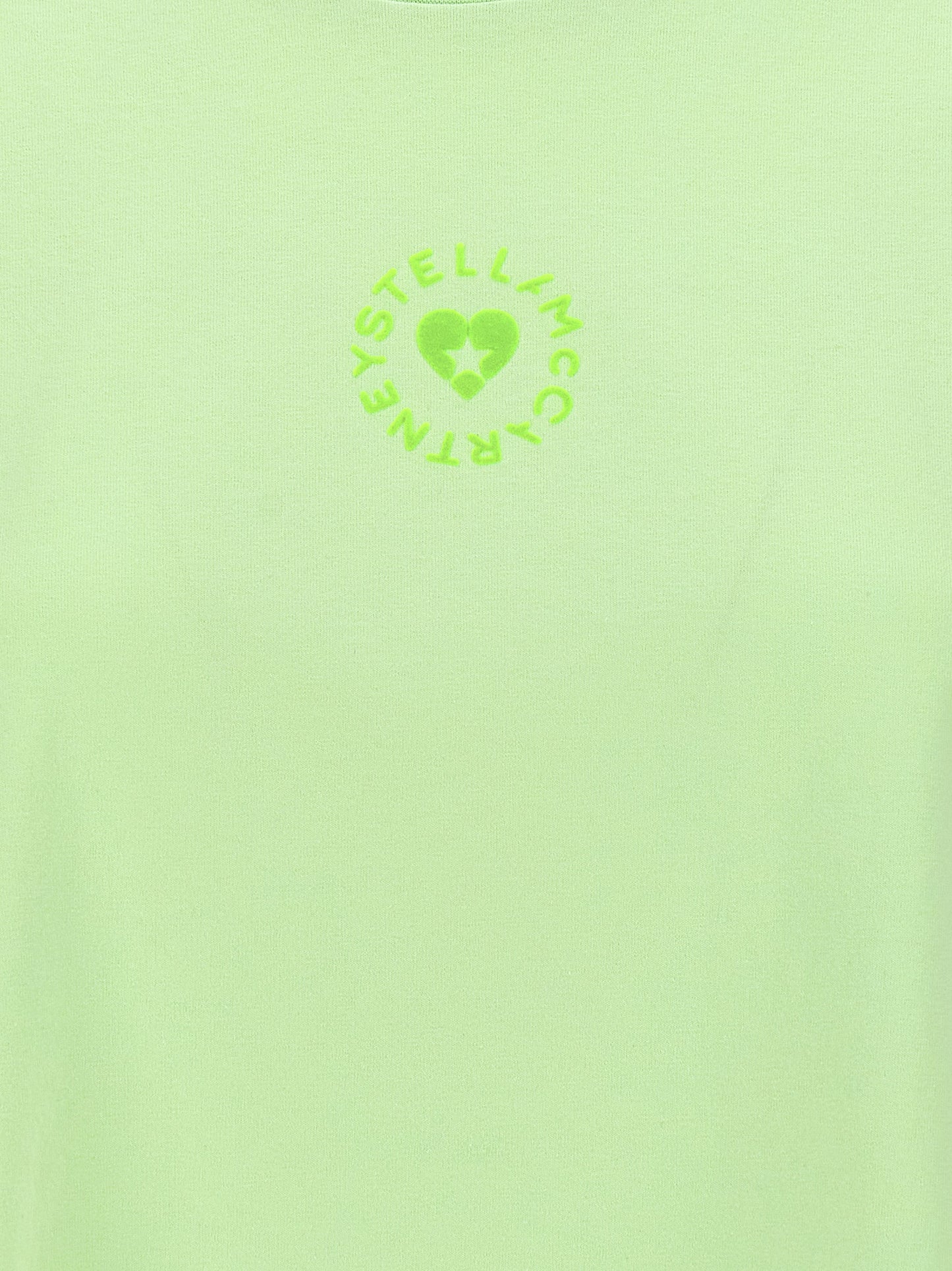 Activewear T-Shirt by Stella McCartney for women in organic cotton bicolour & green features an contemporary design with , a length, and a contemporary .