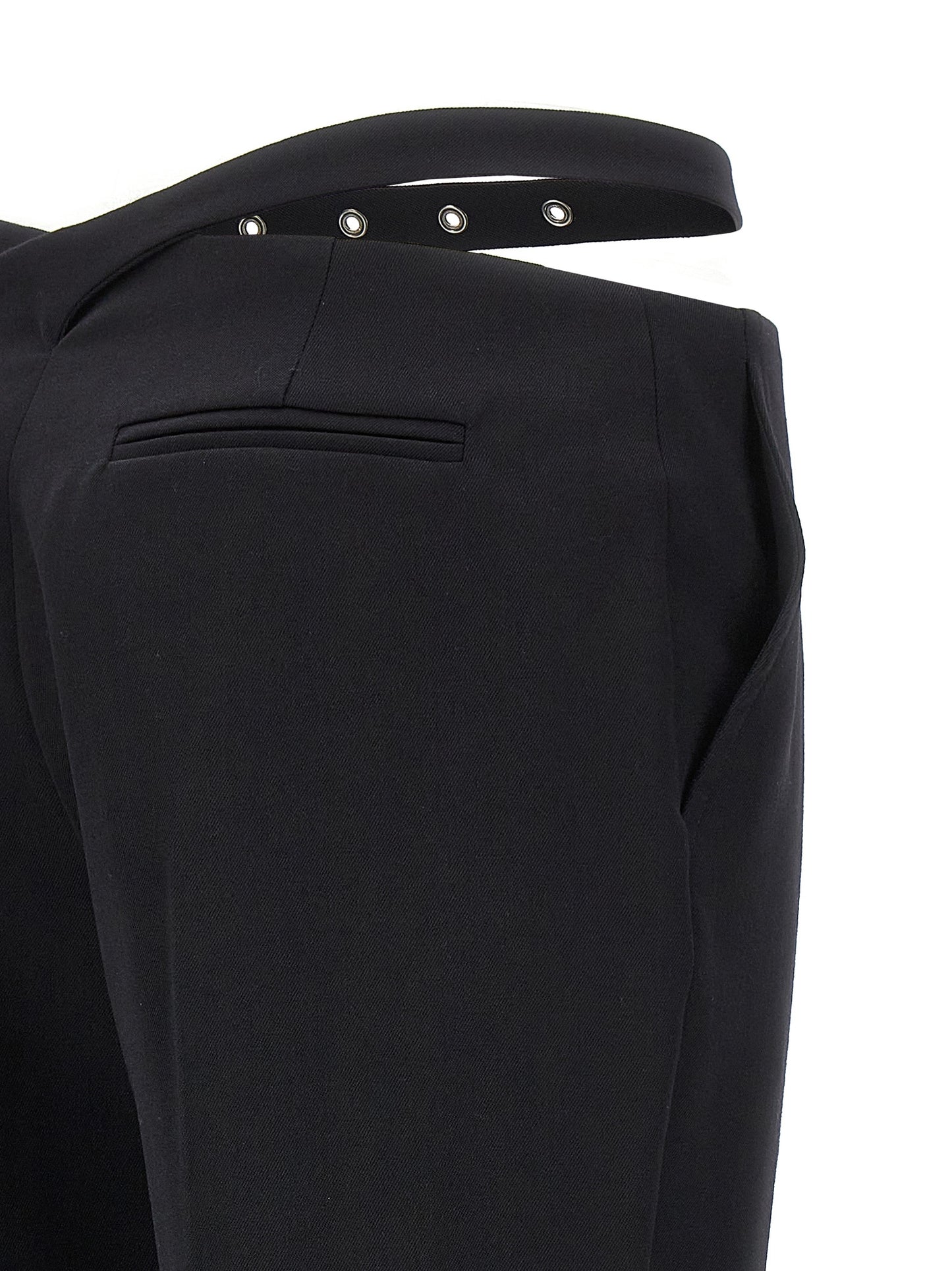 Trousers by The Attico for women in virgin wool black presents a perennial silhouette, meticulously tailored with a slim cut, long finish, and an elegant .