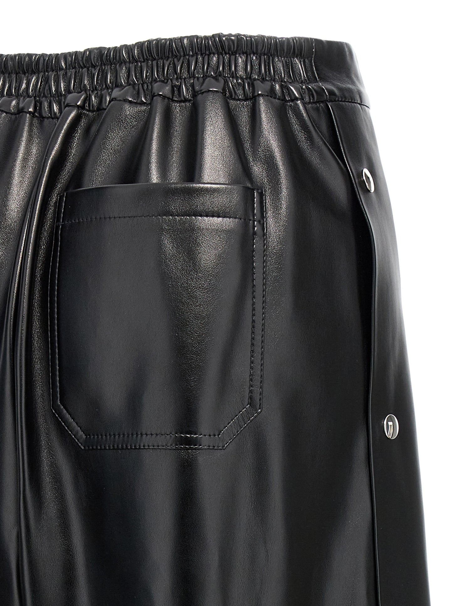 Trousers by Stella McCartney for women in polyester leather black features an sartorial silhouette, showcasing a precise wide and long with a sartorial for a refined look.