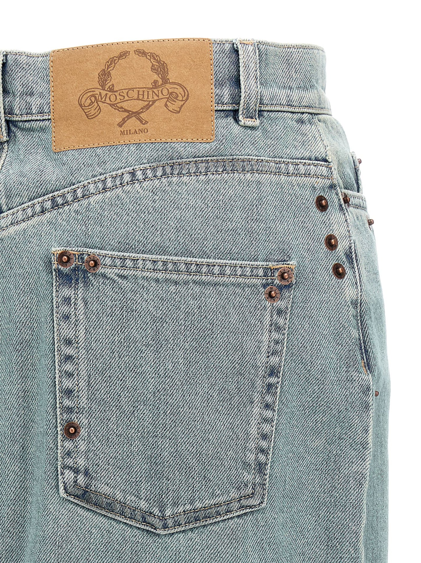 Skirt by Moschino for women in denim cotton light-blue features an tailored silhouette, artfully capturing the essence of Women's Denim Cotton Midi Skirt in a sophisticated midi.