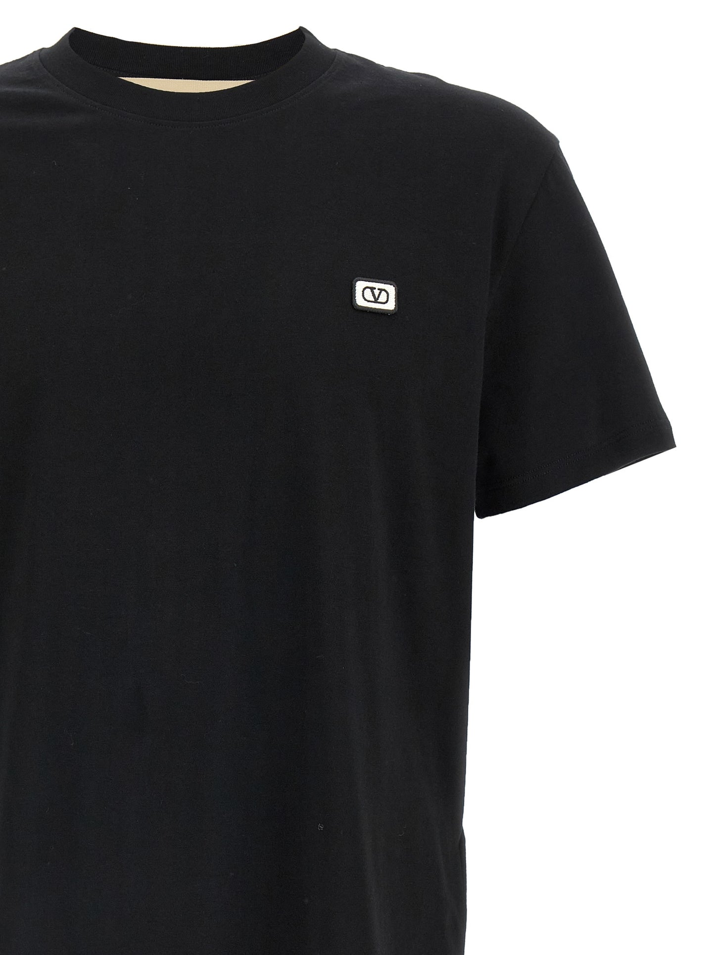 T-Shirt by Valentino Garavani for men in cotton black features an on trend silhouette, perfectly showcasing a on trend and for an elevated aesthetic.