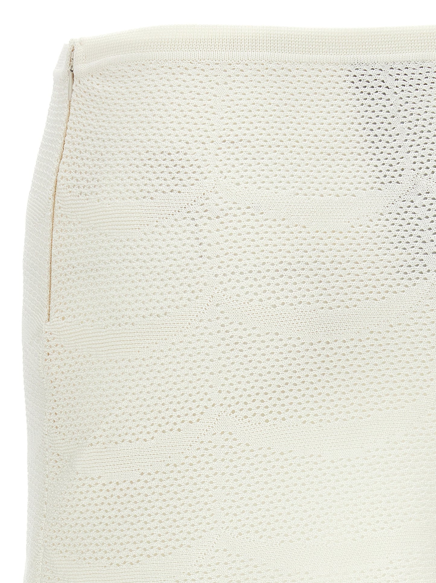 Skirt by Tom Ford for women in cotton & silk white showcases a sultry silhouette, elegantly defined by its mini long and the sophisticated sultry design of the Crochet Women's Cotton & Silk Mini Long Skirt.