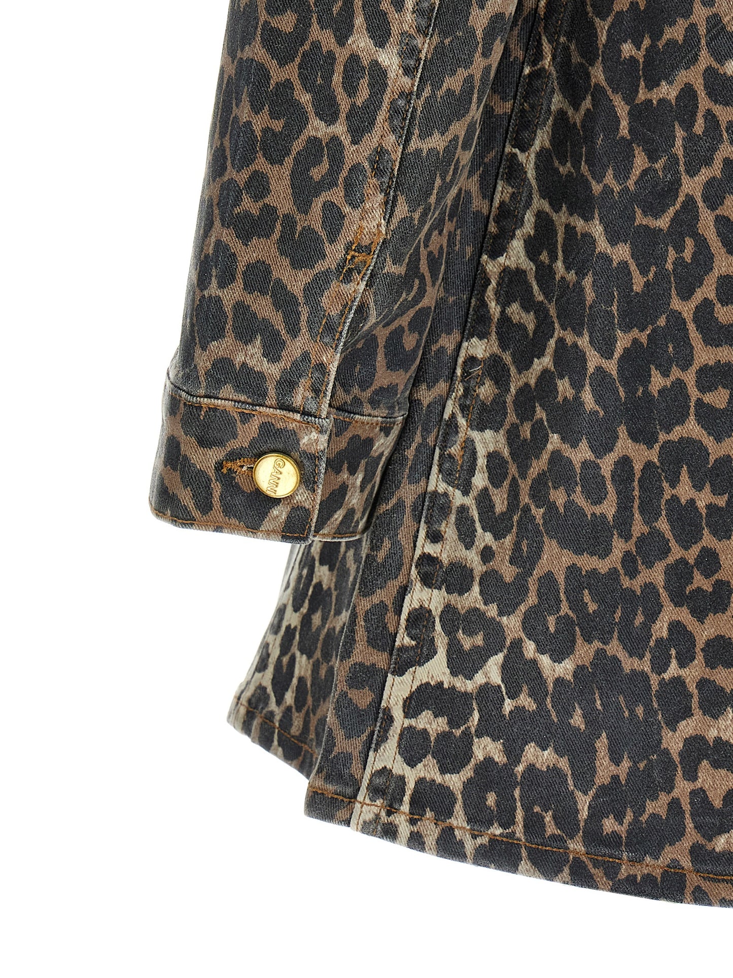 Dress by Ganni for women in stretch denim cotton multicolor, leopard-print & print features an cute silhouette, detailed with a and that elegantly flows into a cute short mini.