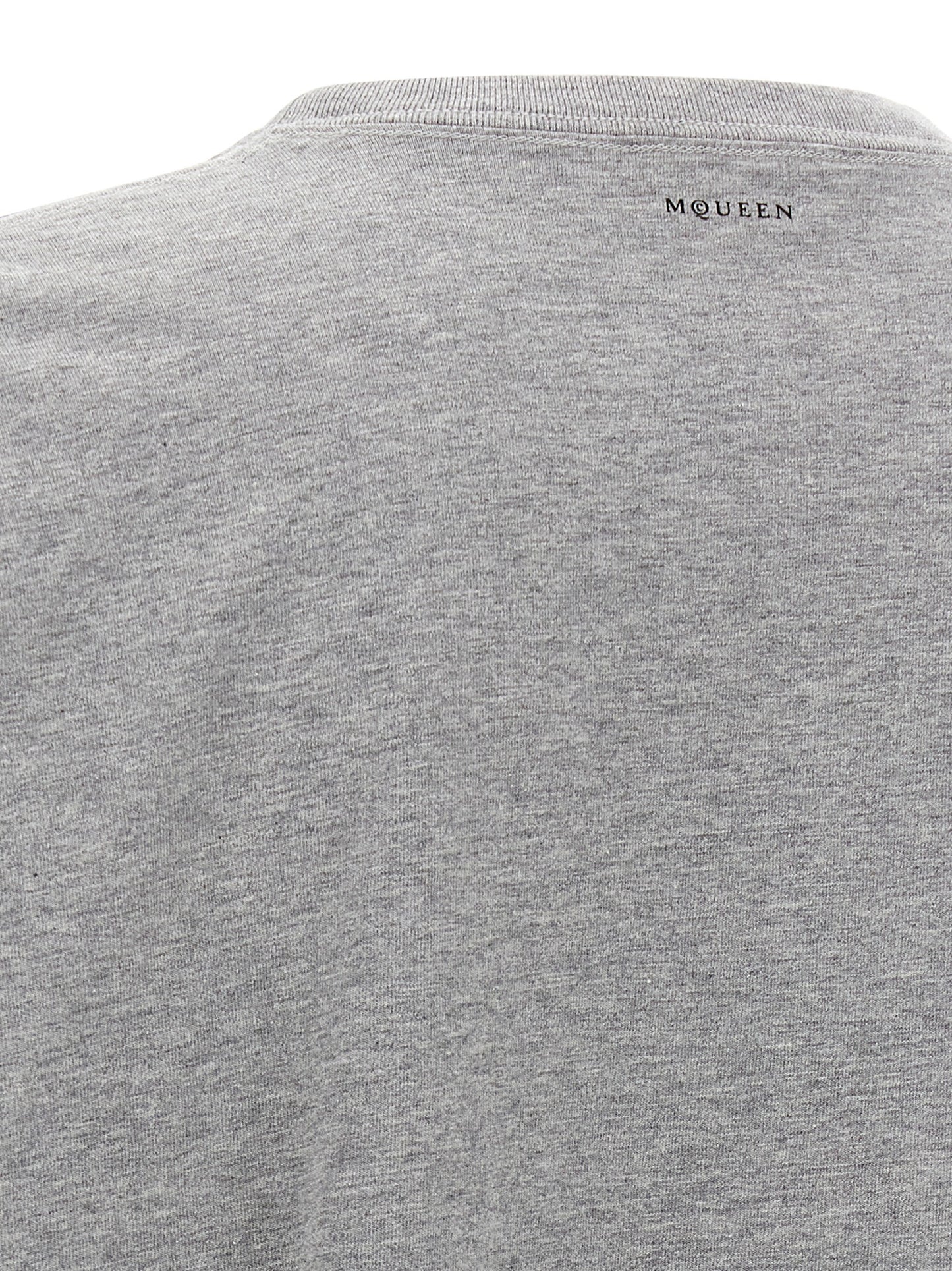 T-Shirt by Alexander McQueen for men in cotton gray & print showcases a chic silhouette, artfully detailed with a chic and for a chic finish.