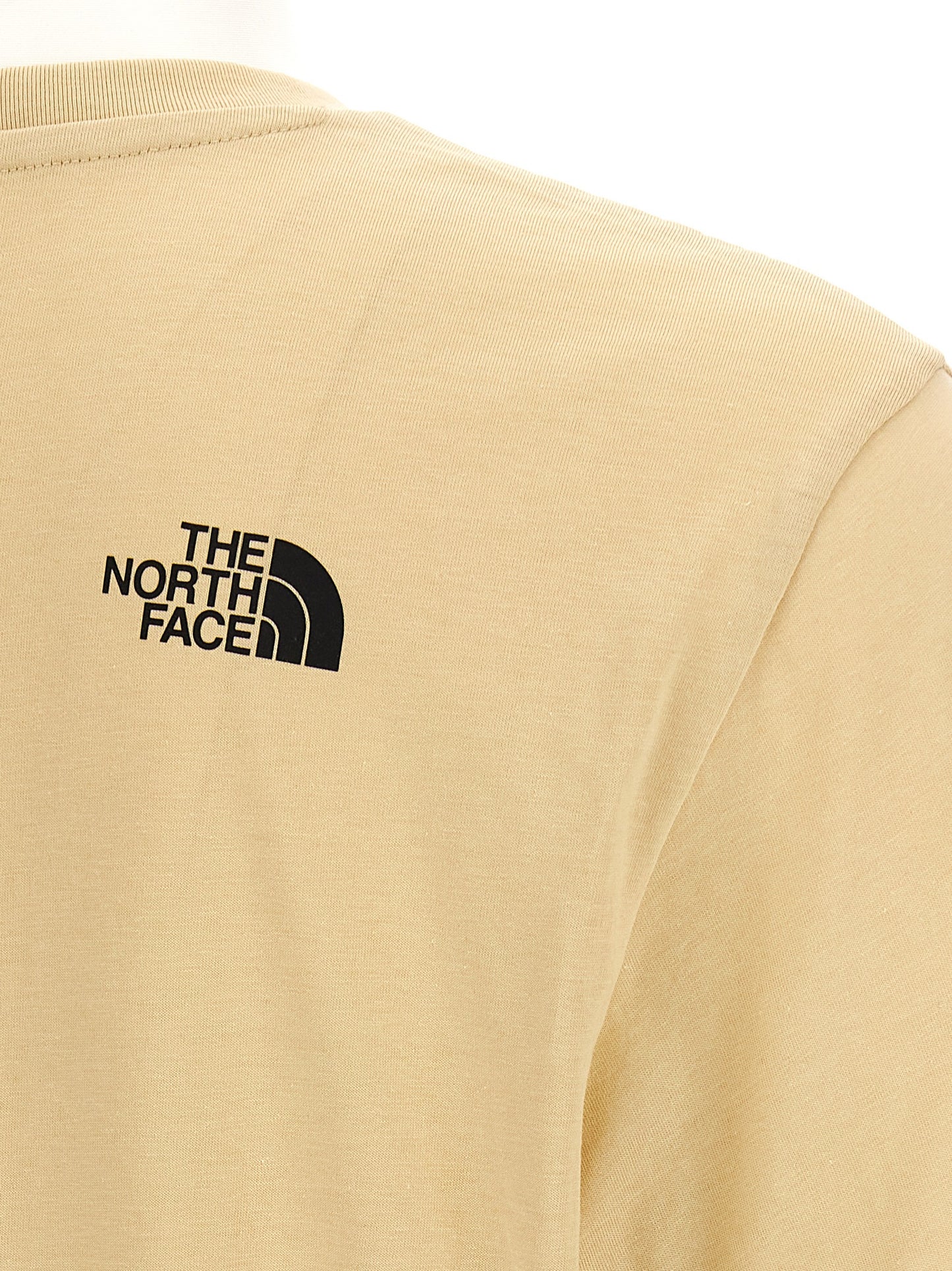 T-Shirt by The North Face for men in cotton polyester beige & print features a plush silhouette, showcasing a sophisticated and for a truly plush finish.