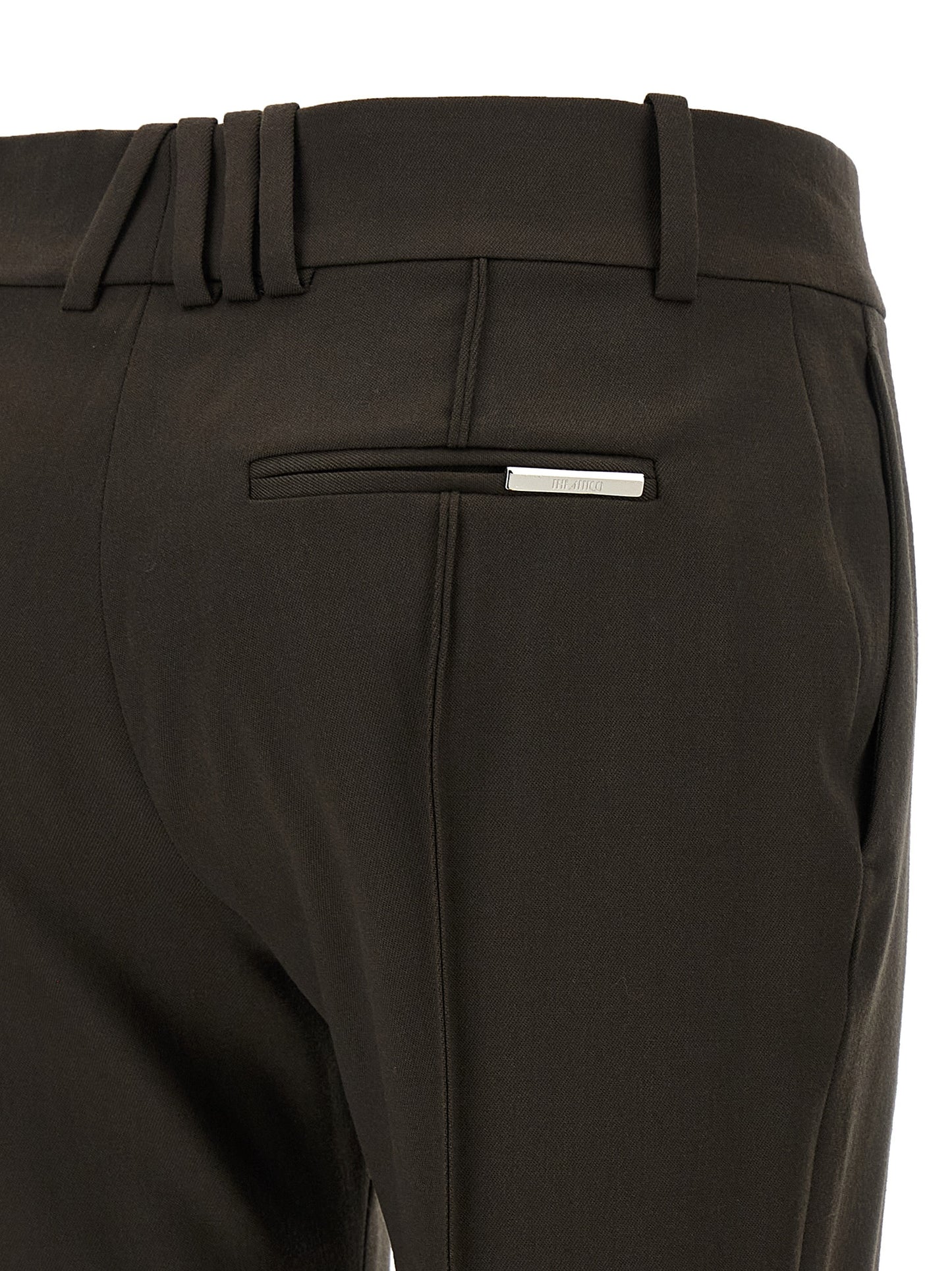 Trousers by The Attico for women in virgin wool brown presents a perennial silhouette, meticulously tailored with a flared cut, long finish, and an elegant .