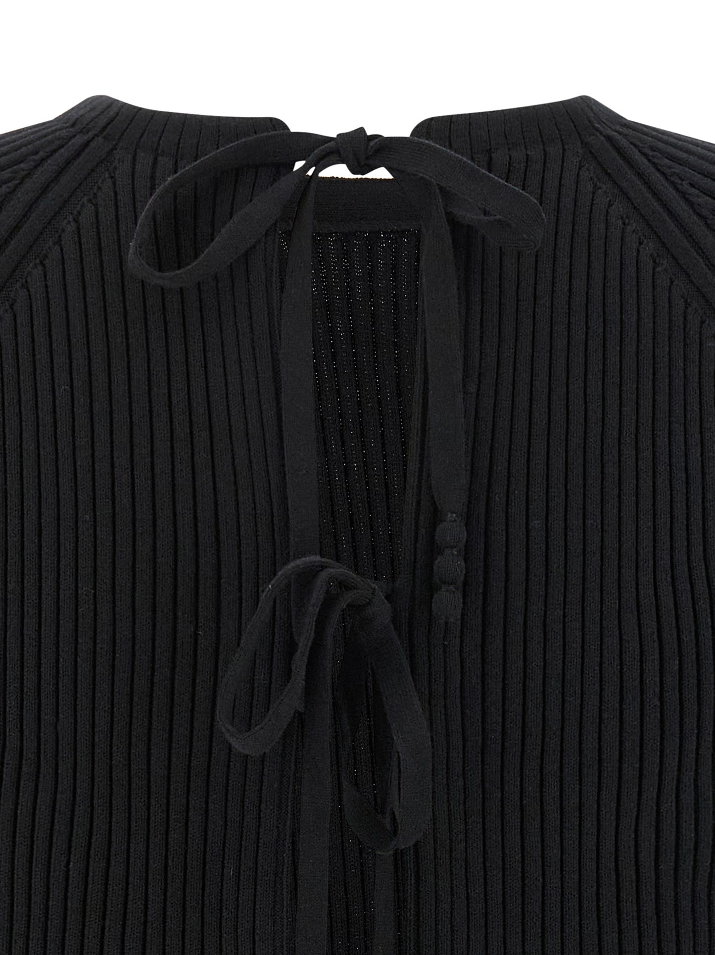 Cardigan by Tory Burch for women in stretch polyamide cotton black showcases a captivating silhouette, artfully detailed with a captivating and for a truly sophisticated captivating look.