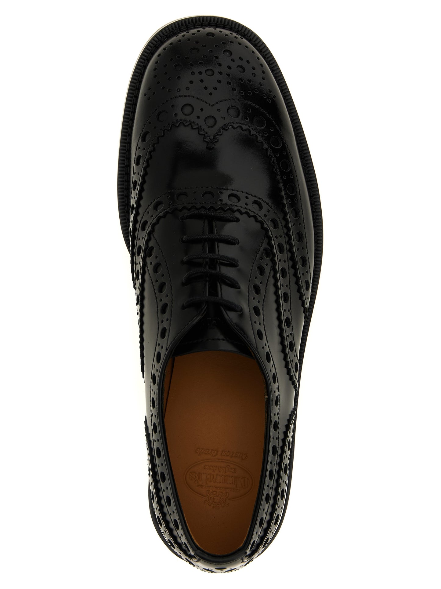 Brogue Brogues Lace-Up Shoes by Church's for unisex in calfskin leather black features an ergonomic silhouette, perfectly showcasing Unisex Calfskin Leather Brogue Brogues Lace-Up Shoes with its distinct and elegant .