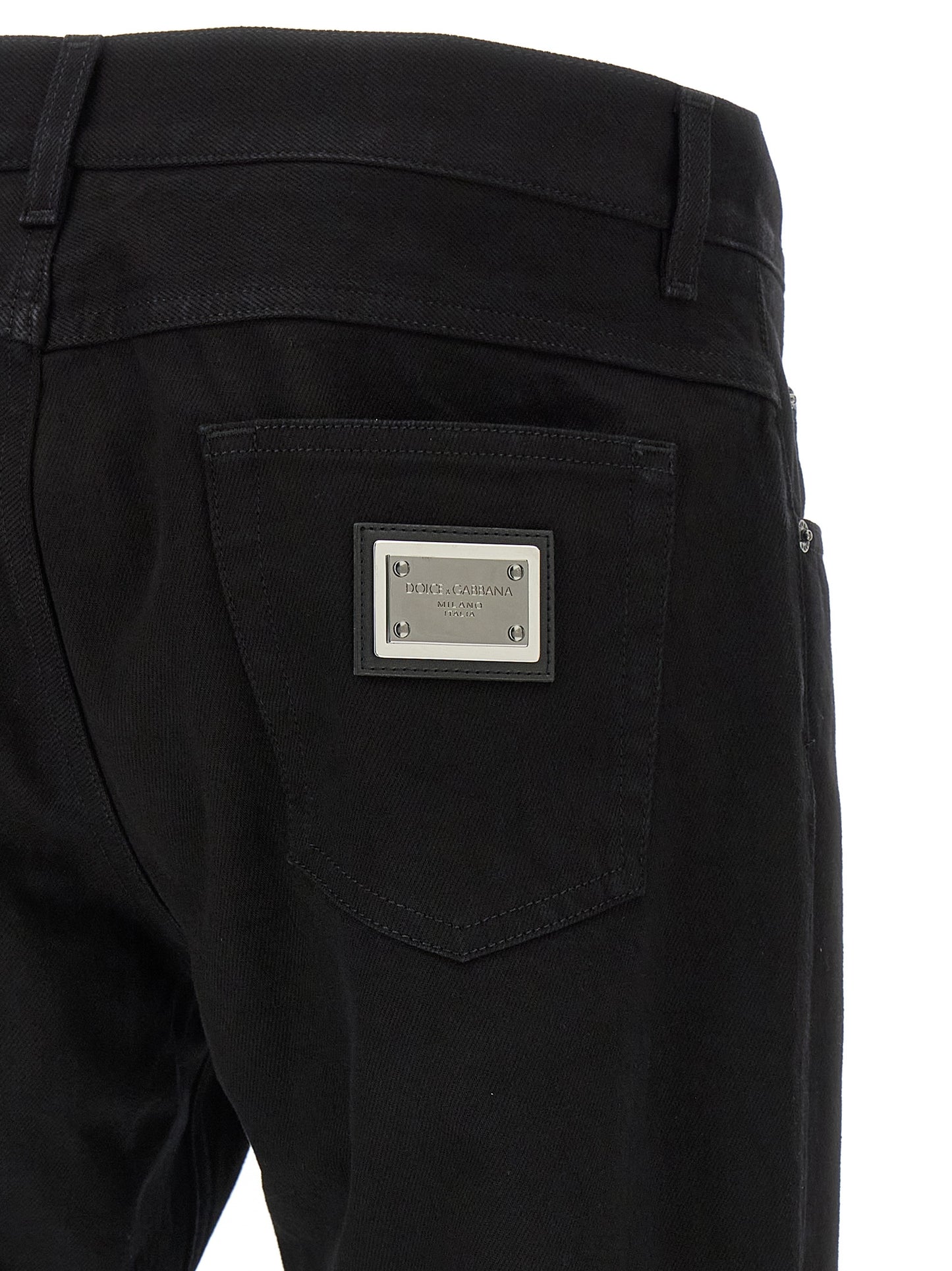 Jeans by Dolce & Gabbana for men in denim cotton black presents a tailored silhouette, showcasing a tailored straight-leg and long cut with a refined for a truly tailored aesthetic.