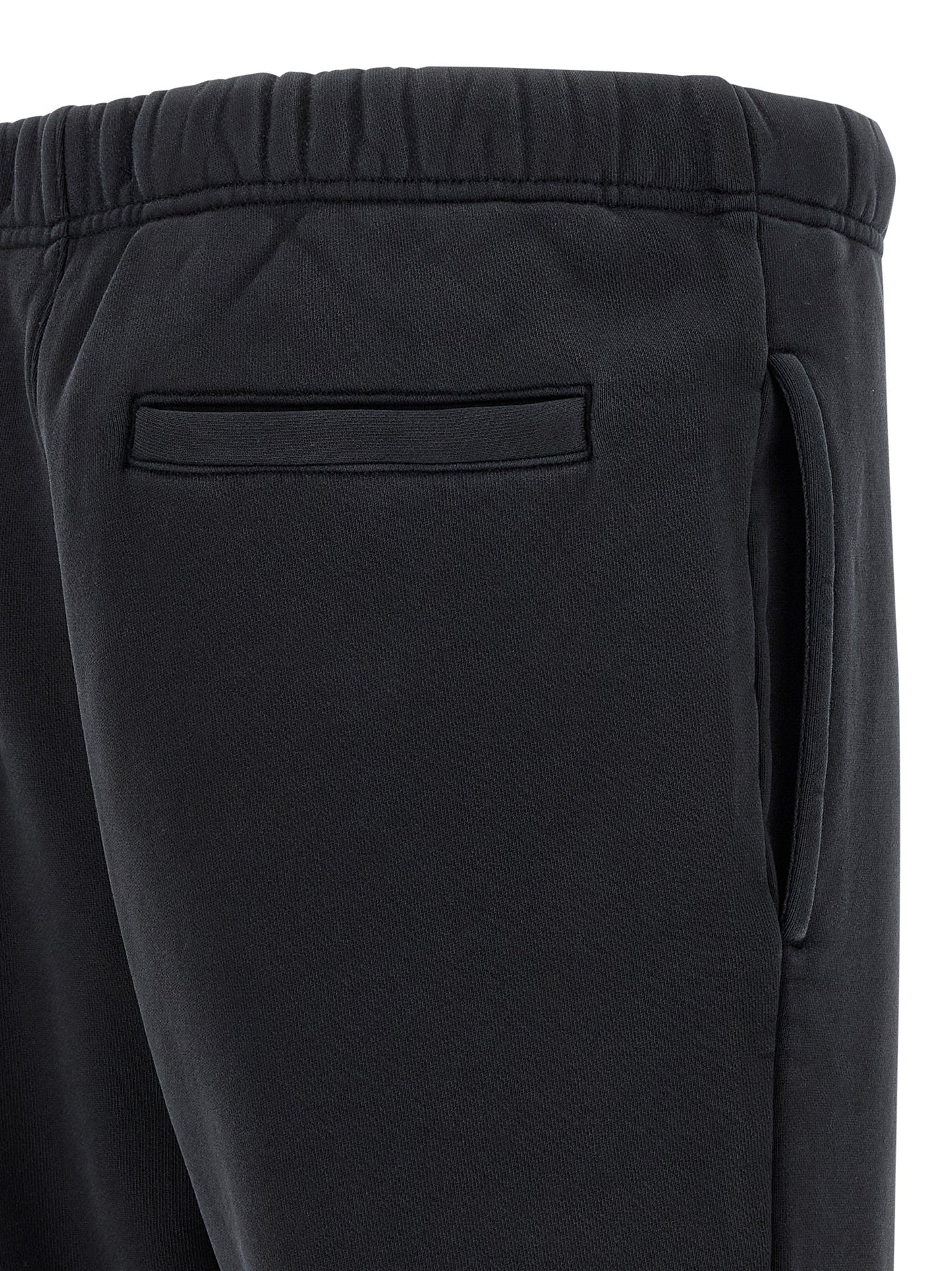 Joggers by PURPLE for men in cotton black & purple features a refined silhouette with a refined straight-leg & wide, defined by a and a refined long for a refined finish.