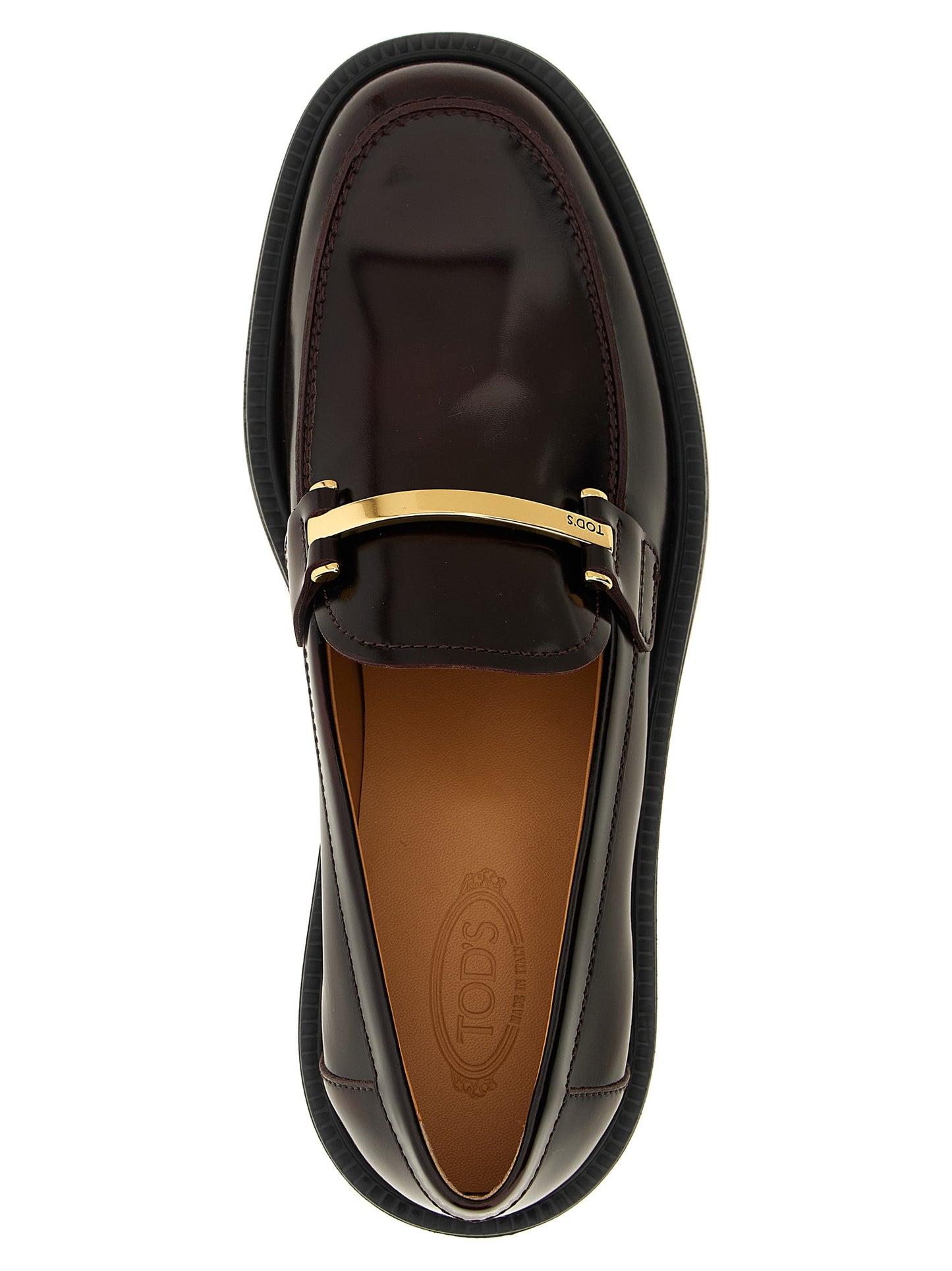 Flat Loafer Slip-On Shoes by Tod's for women in calfskin leather bordeaux showcases a resplendent City Women's Calfskin Leather Flat Loafer Slip-On Shoes aesthetic, defined by its resplendent and elegant flat.