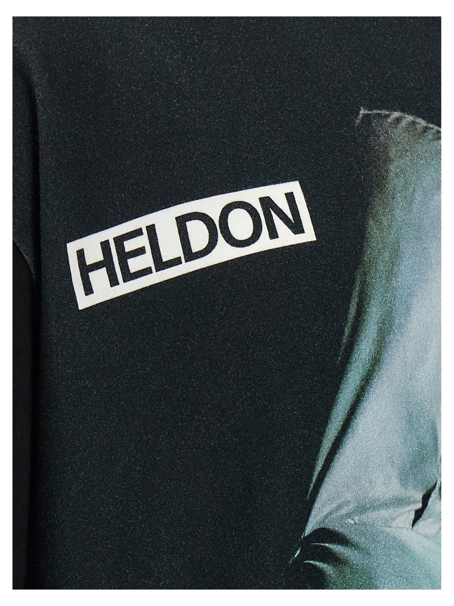 T-Shirt by Undercover for men in cotton black & print features an edgy silhouette, meticulously detailed with a sophisticated and for a truly edgy finish.