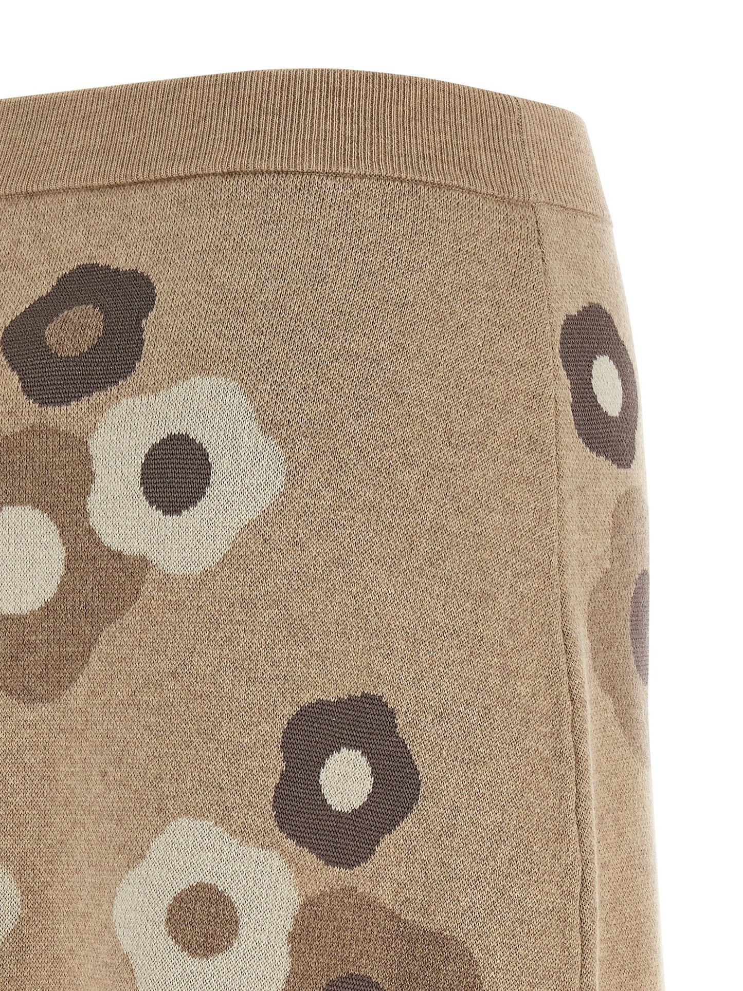 Skirt by Kenzo for women in wool cotton & viscose beige, dots & signature features a captivating silhouette, showcasing the captivating Women's Wool Cotton & Viscose Long Skirt design with a sophisticated long for a captivating look.