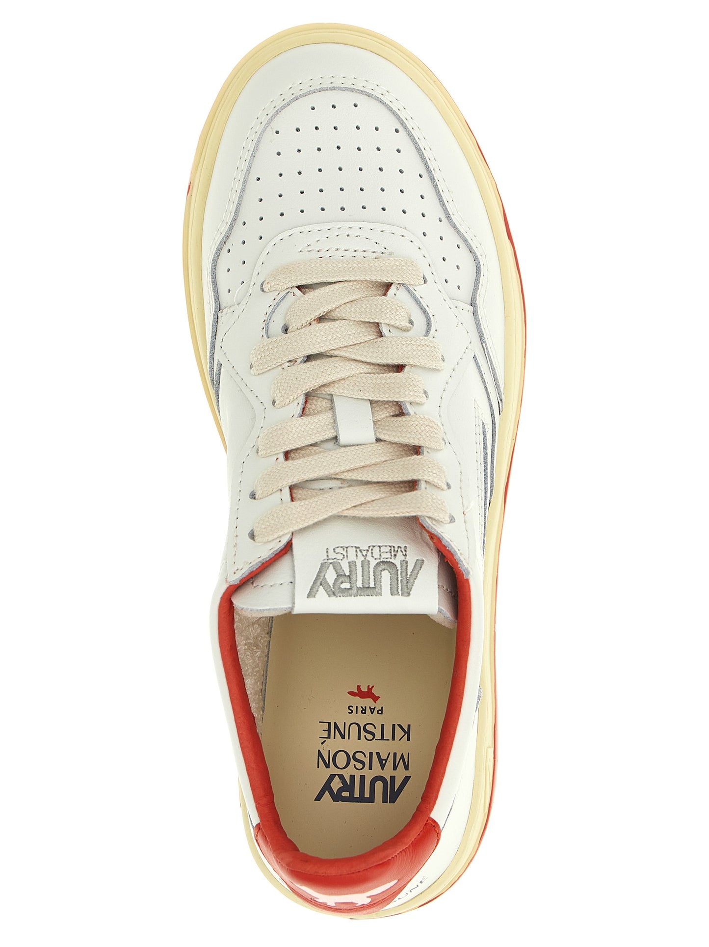 Sneakers by Autry for women in goatskin leather multicolor & red presents a sumptuous silhouette, artfully capturing the essence of the Women's Low Top Goatskin Leather Sneakers with its sumptuous low-top style design.