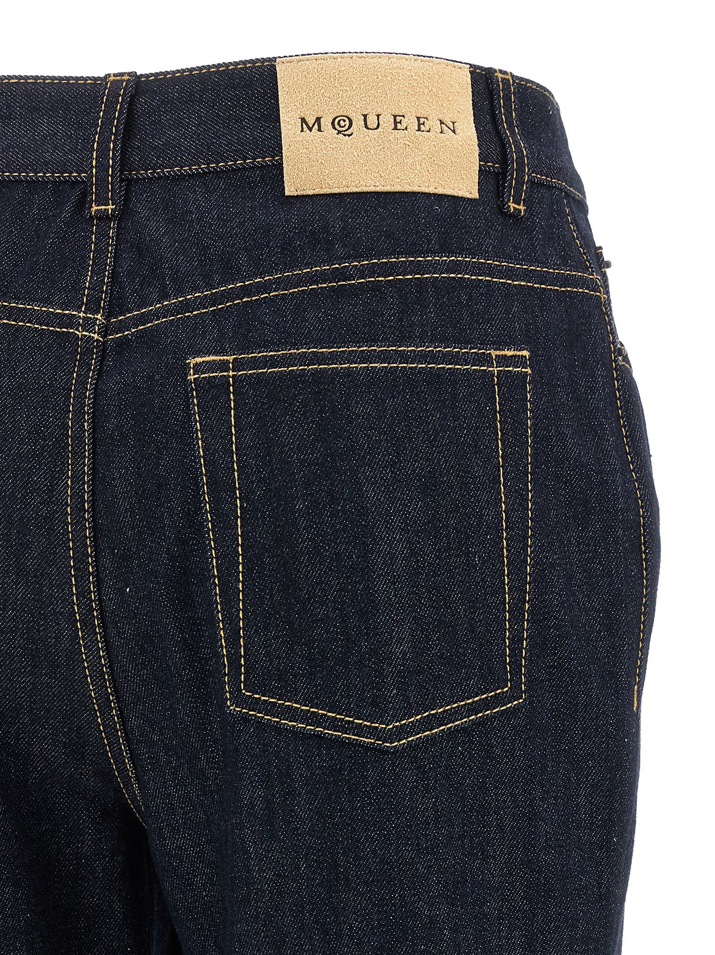Jeans by Alexander McQueen for women in denim cotton & suede leather blue features an refined tailoring silhouette, showcasing a premium straight-leg & flared with a and long cut for a refined tailoring look.