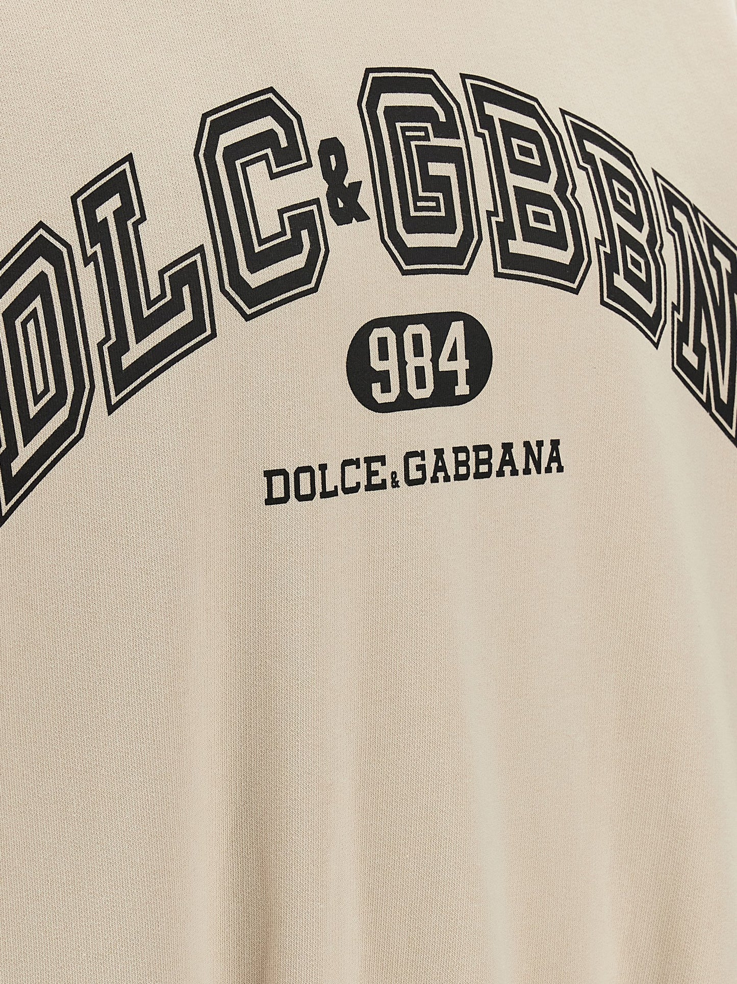 Sweatshirt Hoodie by Dolce & Gabbana for men in cotton beige & print features an luminous silhouette, showcasing a sophisticated and for a truly luminous look.