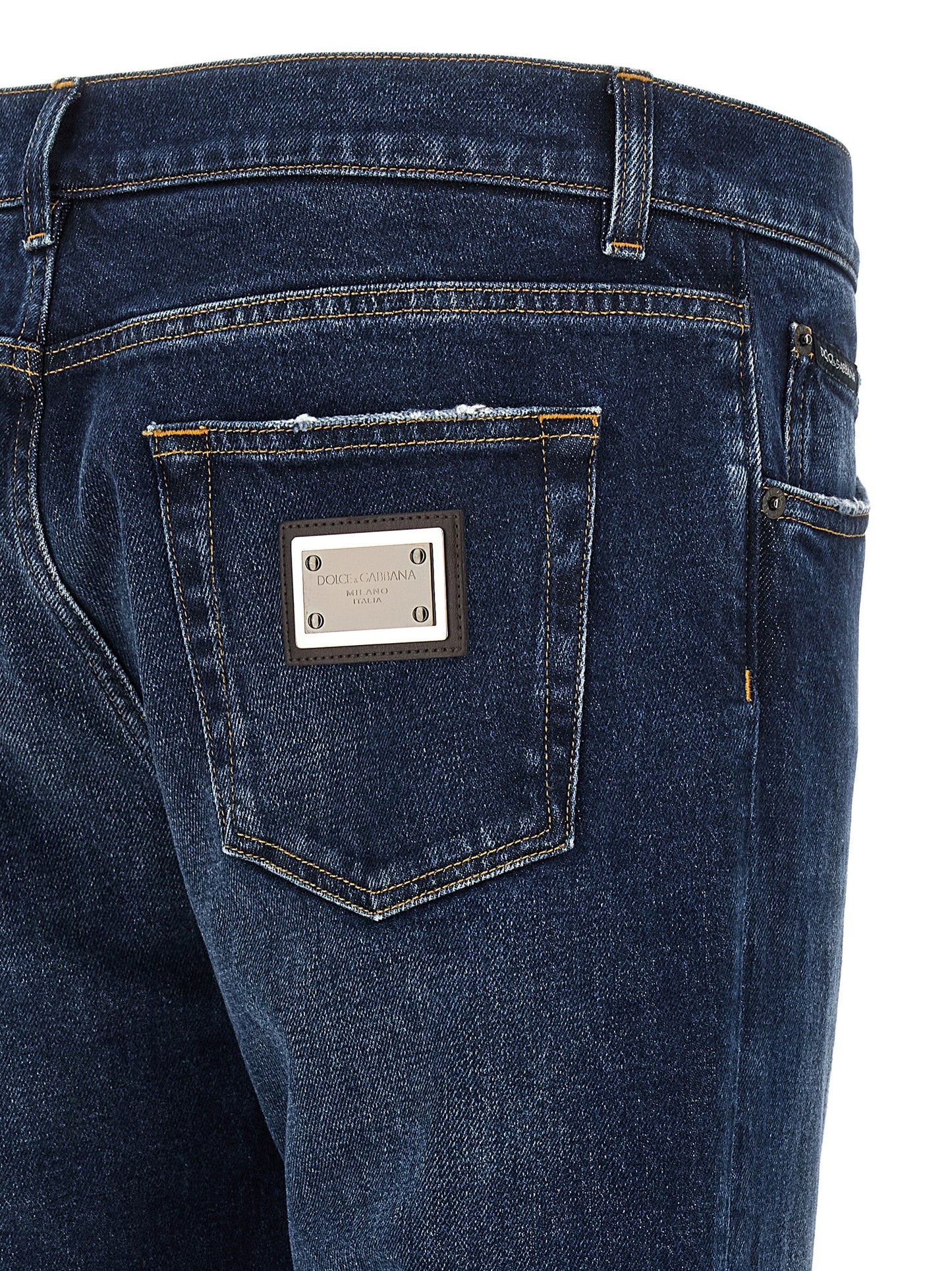 Jeans by Dolce & Gabbana for men in denim cotton blue features a polished silhouette with a polished straight-leg, reaching a polished long and finished with a polished low rise.