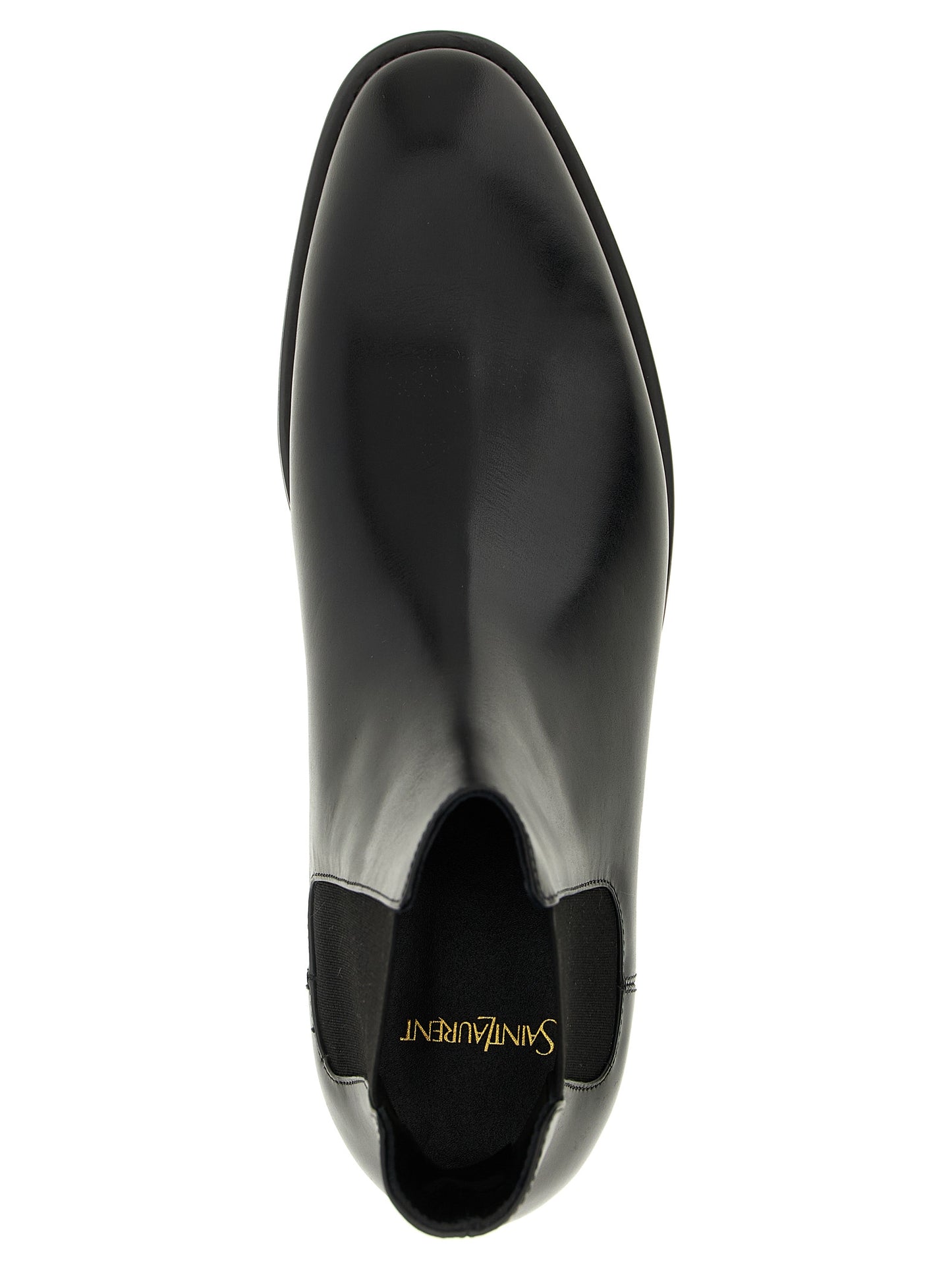 Ankle Chelsea Boots by Saint Laurent for men in calfskin leather black features an avant-garde Men's Calfskin Leather Ankle Chelsea Boots silhouette, defined by a sophisticated and a avant-garde almond toe style.