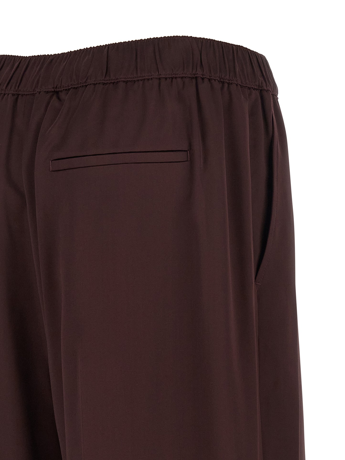 Trousers by Tory Burch for women in viscose bordeaux features a artisanal silhouette, showcasing a sophisticated straight-leg with a long and for a artisanal finish.