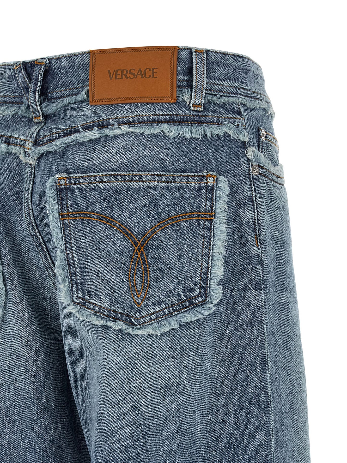 Jeans by Versace for women in cotton denim blue & signature features an sartorial relaxed-fit, wide & boyfriend and long with a low rise cut for a sartorial finish.