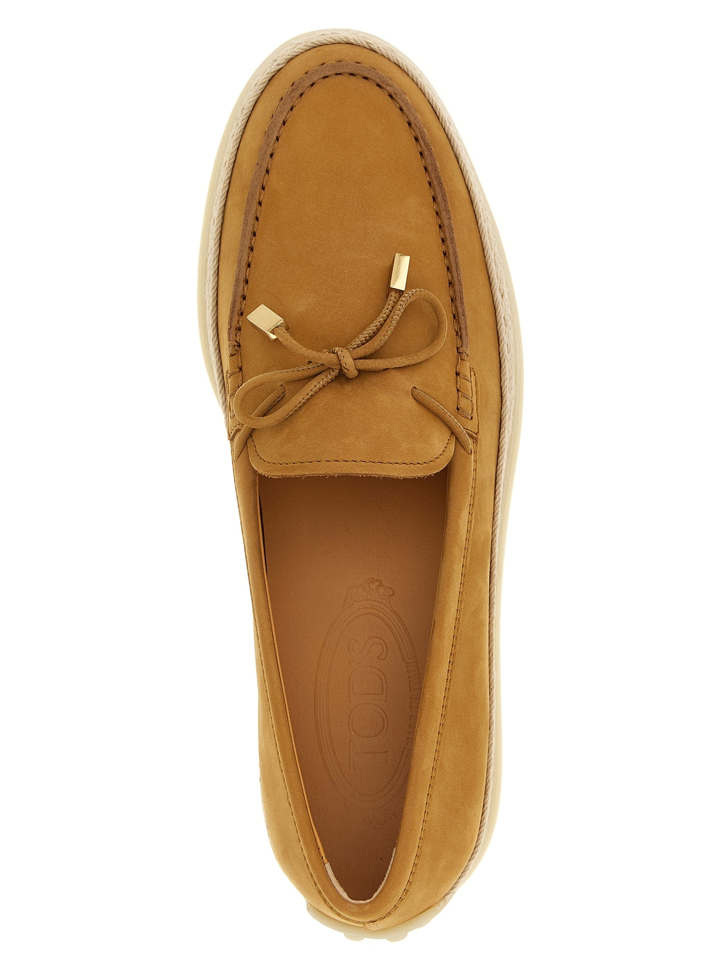 Flat Loafer Slip-On Shoes by Tod's for women in raffia & suede calfskin leather beige showcases a resplendent Women's Raffia & Suede Calfskin Leather Flat Loafer Slip-On Shoes aesthetic, defined by its resplendent and elegant flat.