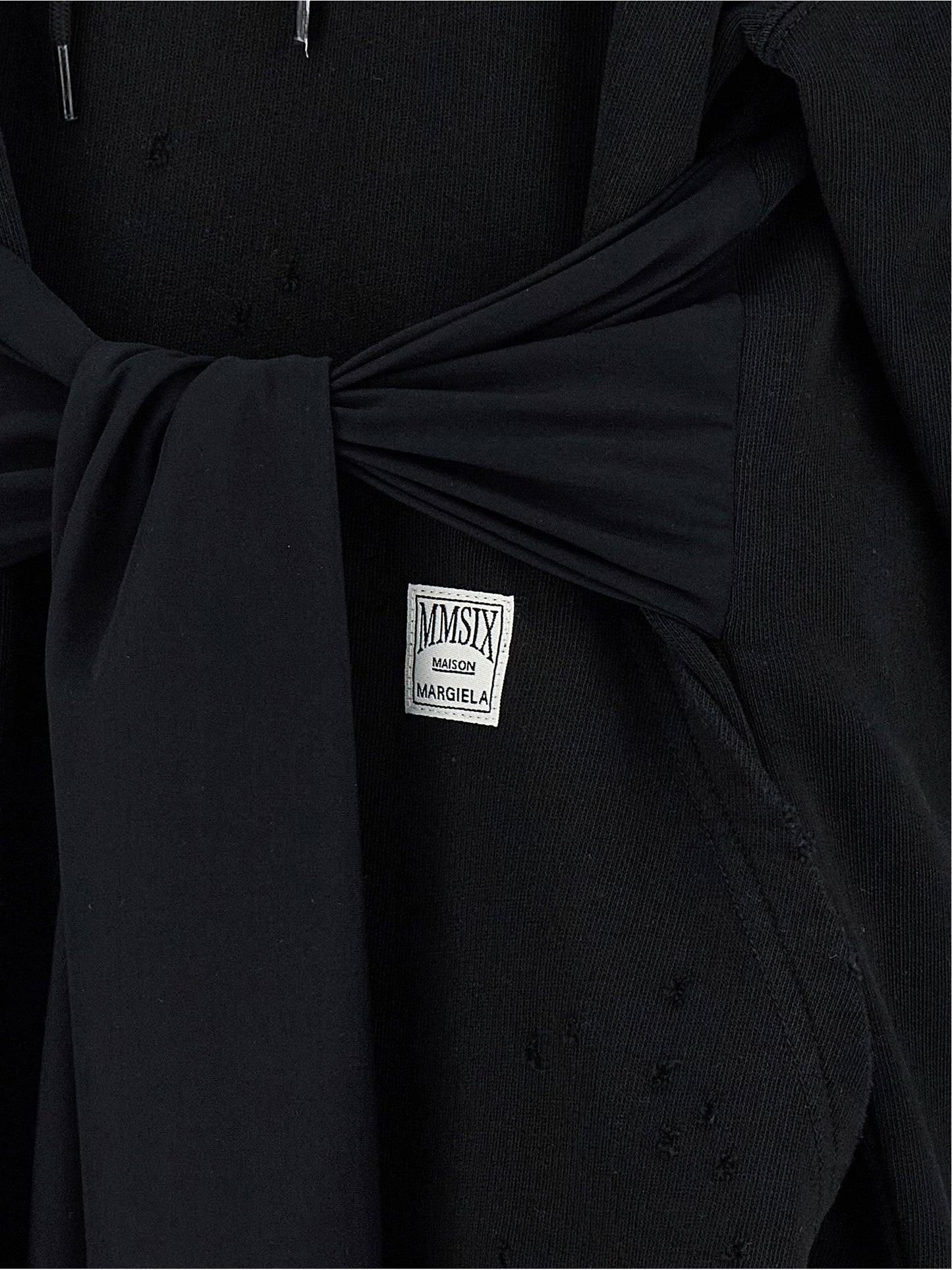 Hooded Dress by MM6 Maison Margiela for women in cotton black & white features an magnificent silhouette, artfully detailed with a magnificent and that flows into an magnificent short mini.