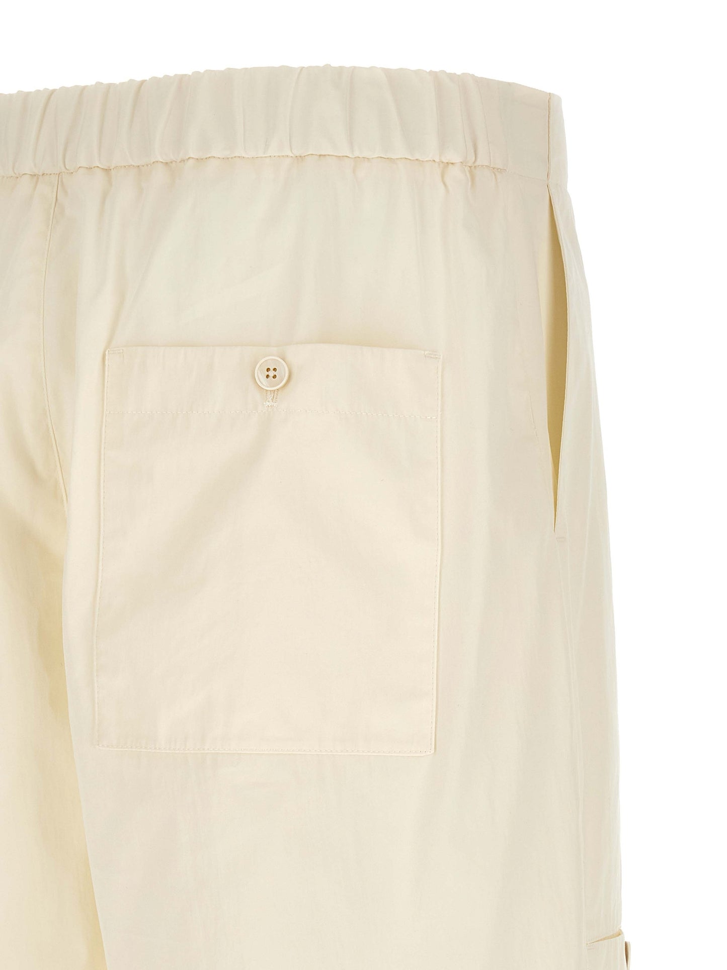 Cargo Pants by Jil Sander for men in cotton beige features an tailored wide with a mid rise and long, creating a tailored utilitarian silhouette.