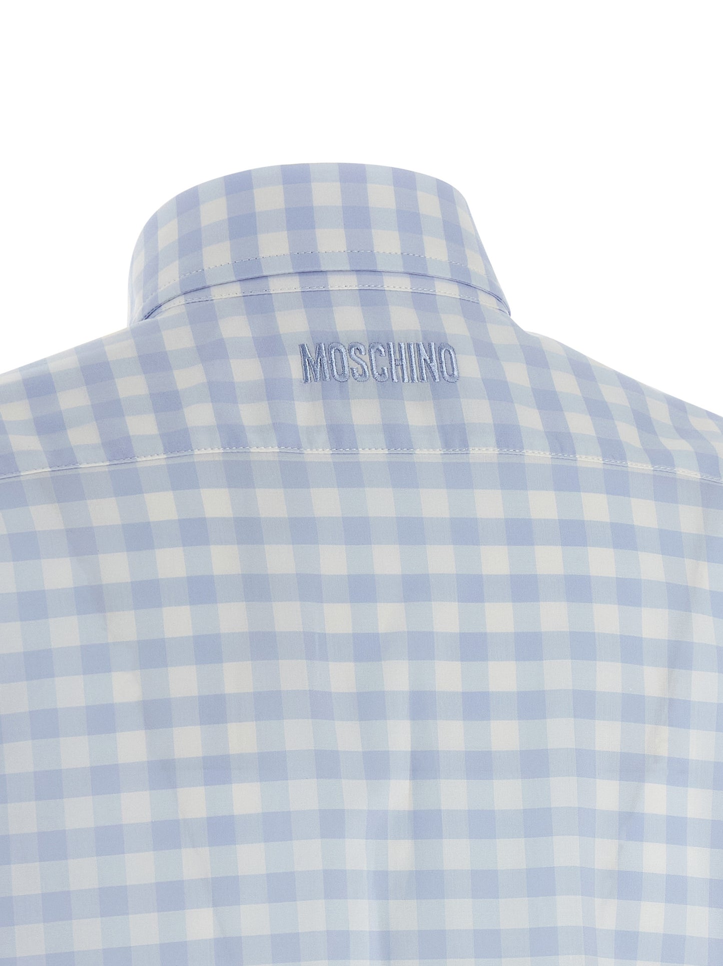 Blouse by Moschino for women in cotton light-blue & patterned features an polished silhouette, showcasing a sophisticated and detail for a truly polished finish.