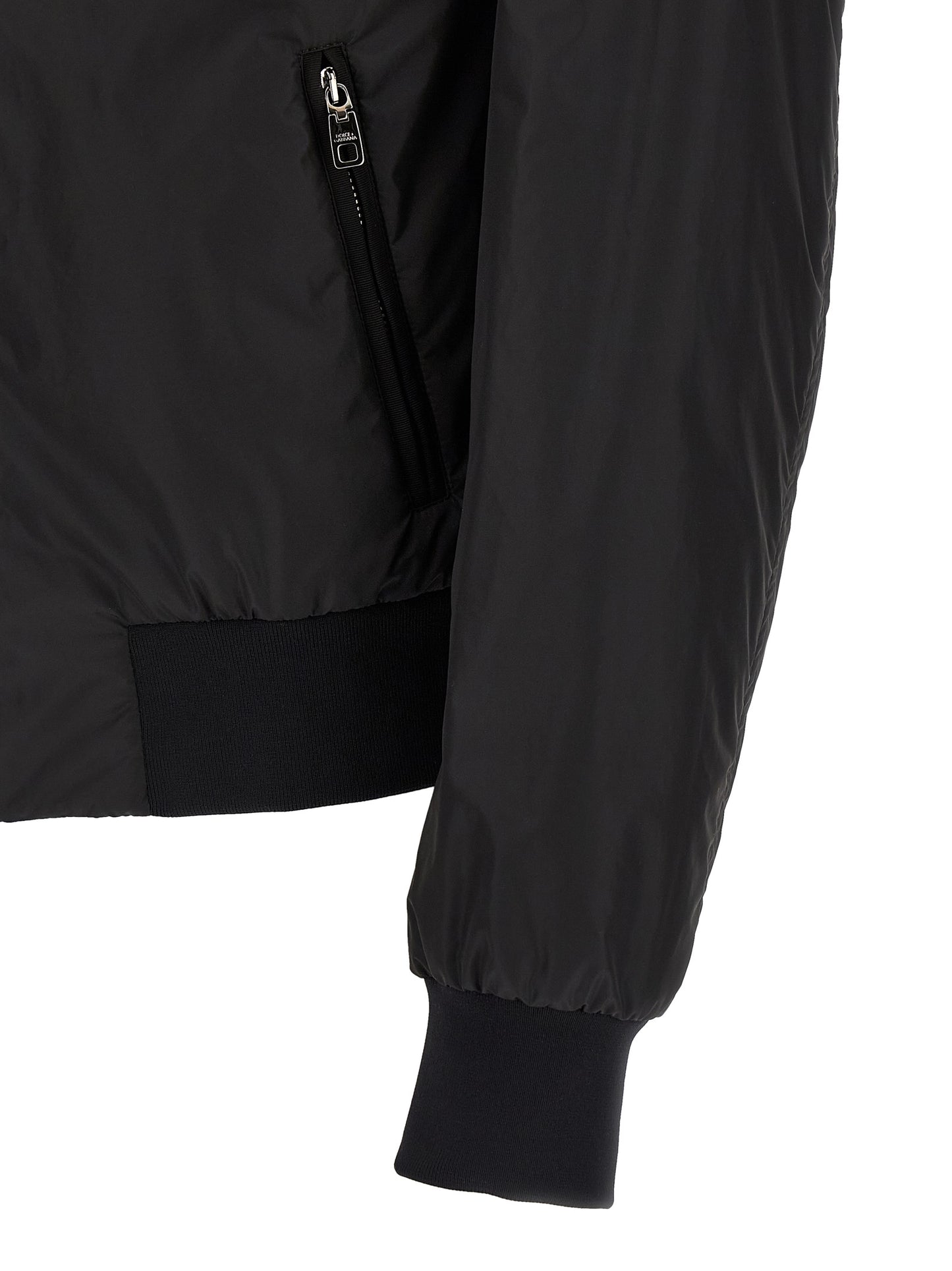 Bomber Jacket by Dolce & Gabbana for men in polyamide black features an contemporary silhouette, showcasing a sophisticated and contemporary pockets for a truly refined look.