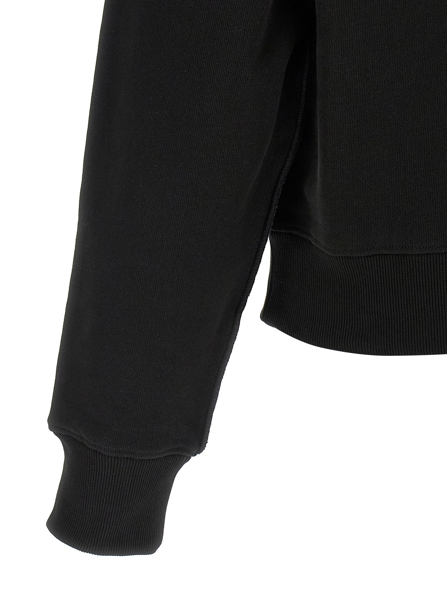 Cardigan by Entire Studios for men in cotton black features a dramatic silhouette, showcasing a sophisticated and dramatic detail for a timeless, premium look.