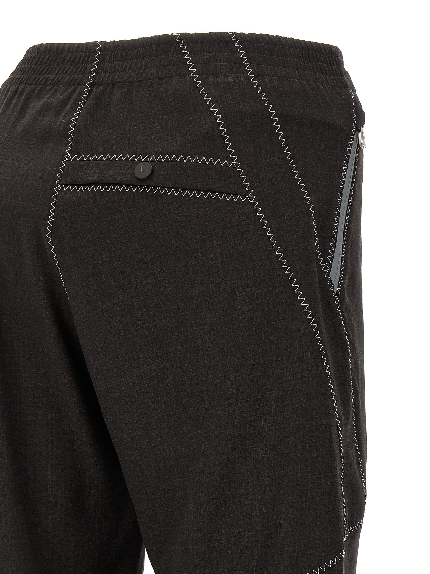 Trousers by Kiko Kostadinov for men in virgin wool brown features a sculptural silhouette, showcasing a sculptural straight-leg and long with a sophisticated for a sculptural finish.