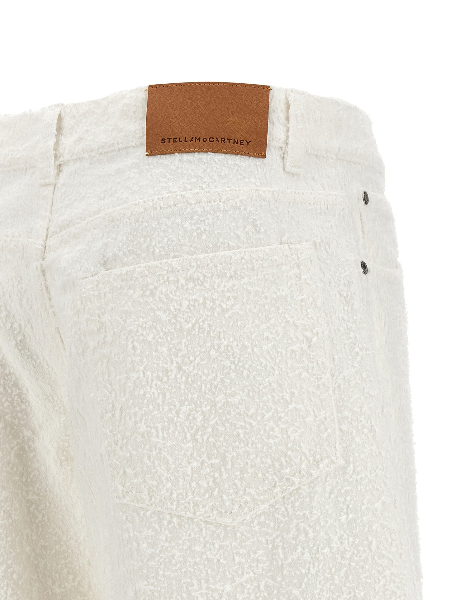 Jeans by Stella McCartney for women in denim cotton white & patterned presents a tailored silhouette, showcasing a tailored wide and long cut with a refined for a truly tailored aesthetic.