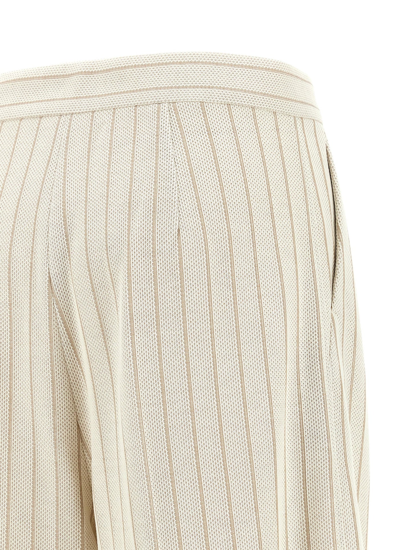 Trousers by Max Mara for women in cotton white & pinstripe presents a perennial silhouette, meticulously tailored with a wide cut, long finish, and an elegant high rise.