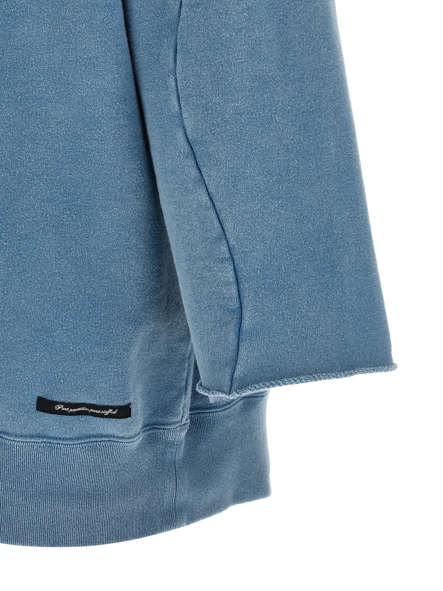 Sweatshirt by Undercover for men in cotton light-blue & print features an exquisite silhouette, showcasing and details for a exquisite look.