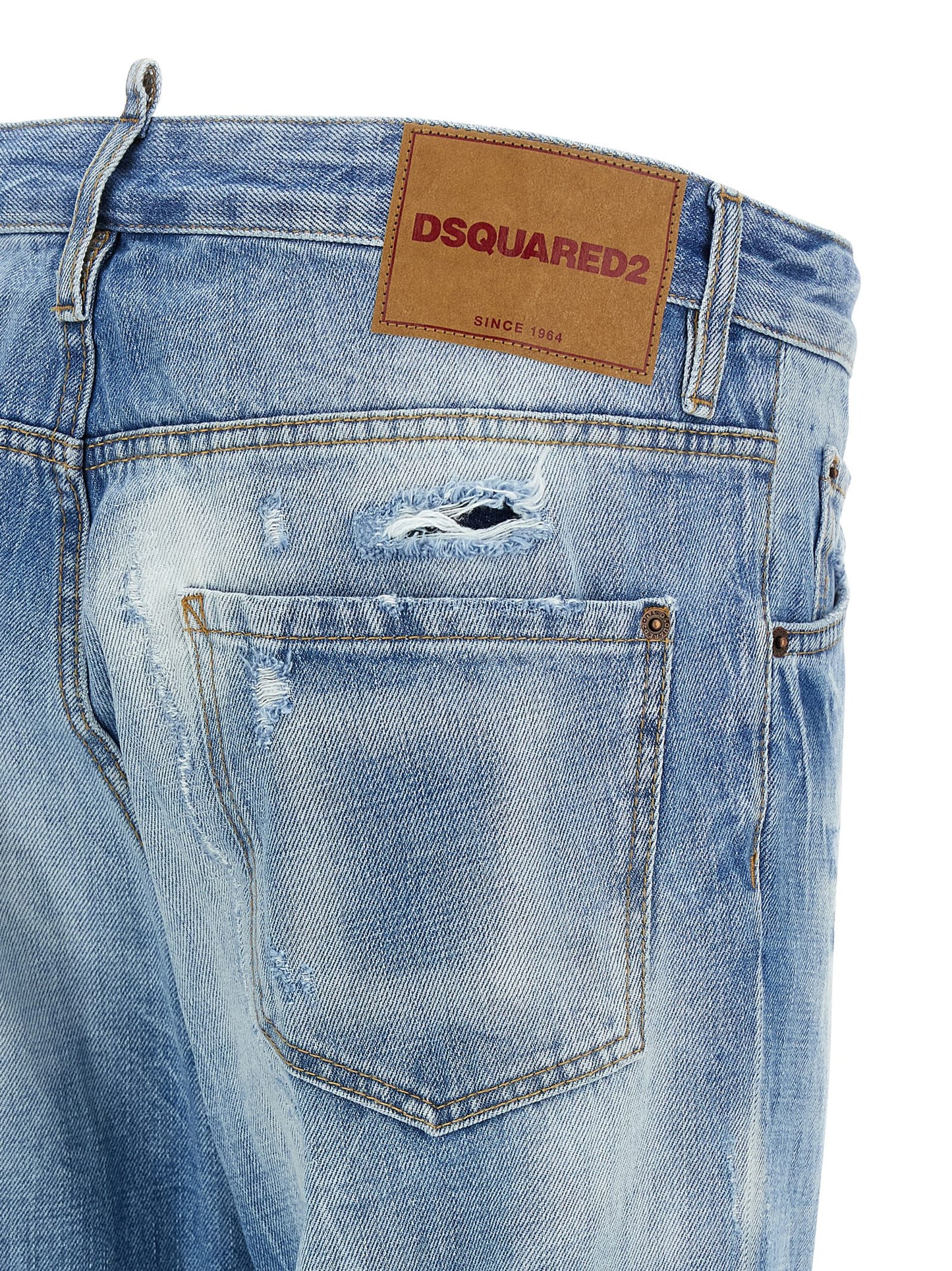 Jeans by Dsquared² for men in cotton denim blue & signature presents a tailored silhouette, showcasing a tailored straight-leg and long cut with a refined low rise for a truly tailored aesthetic.