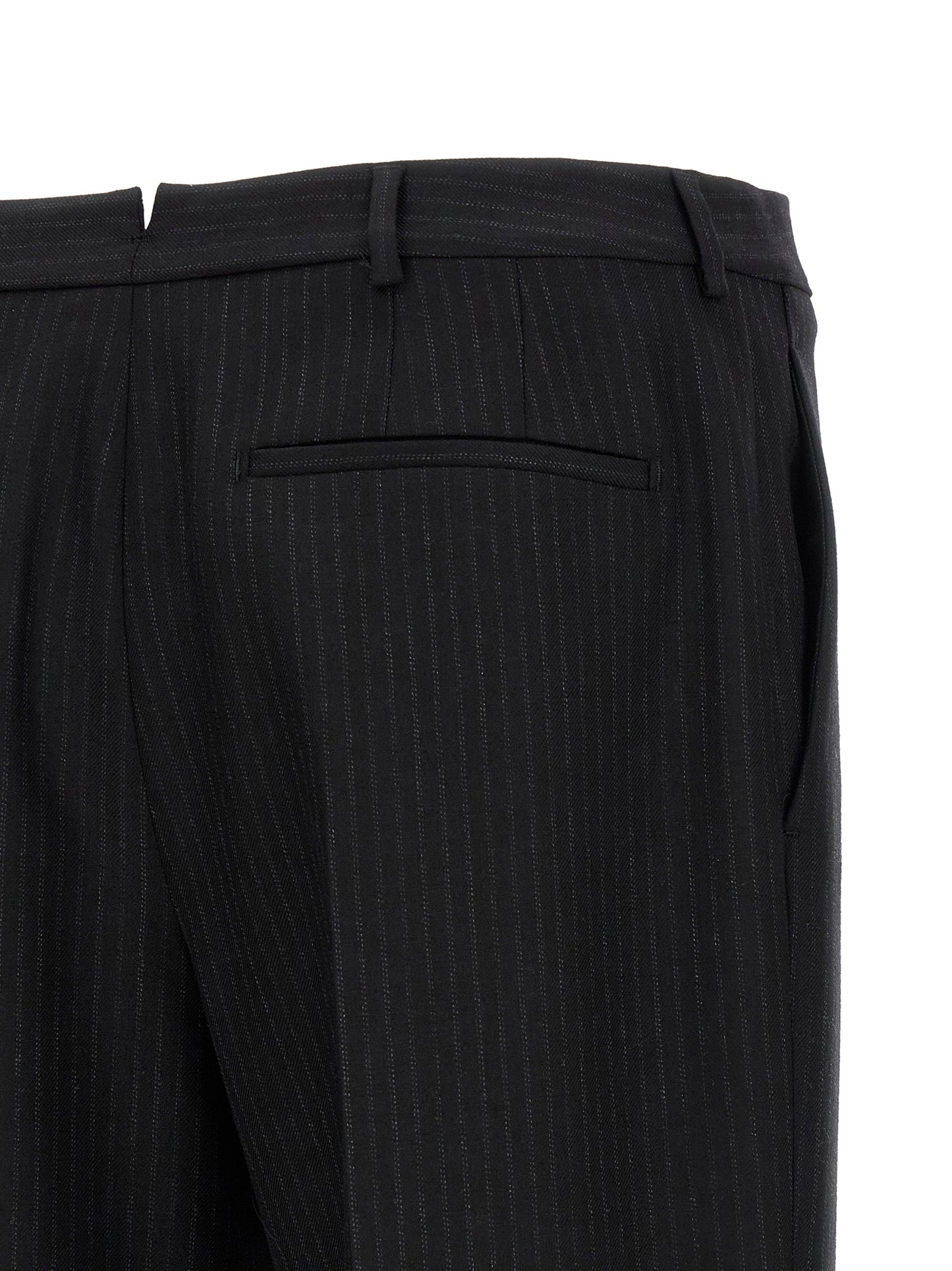 Trousers by Saint Laurent for men in wool black presents a smart silhouette, meticulously detailed with a smart , a smart long, and a smart mid rise.