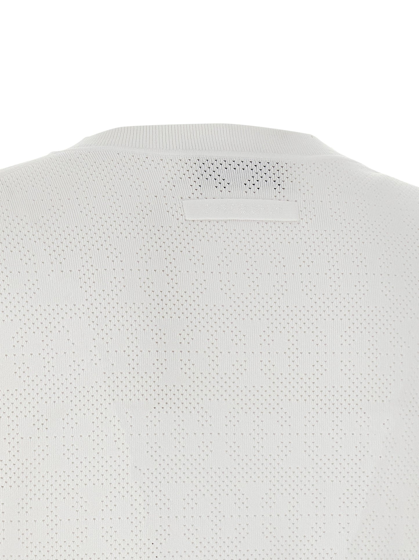 Cardigan by Tory Burch for women in viscose polyester & polyamide white features an impeccable silhouette, showcasing a sophisticated and detail for a truly impeccable finish.