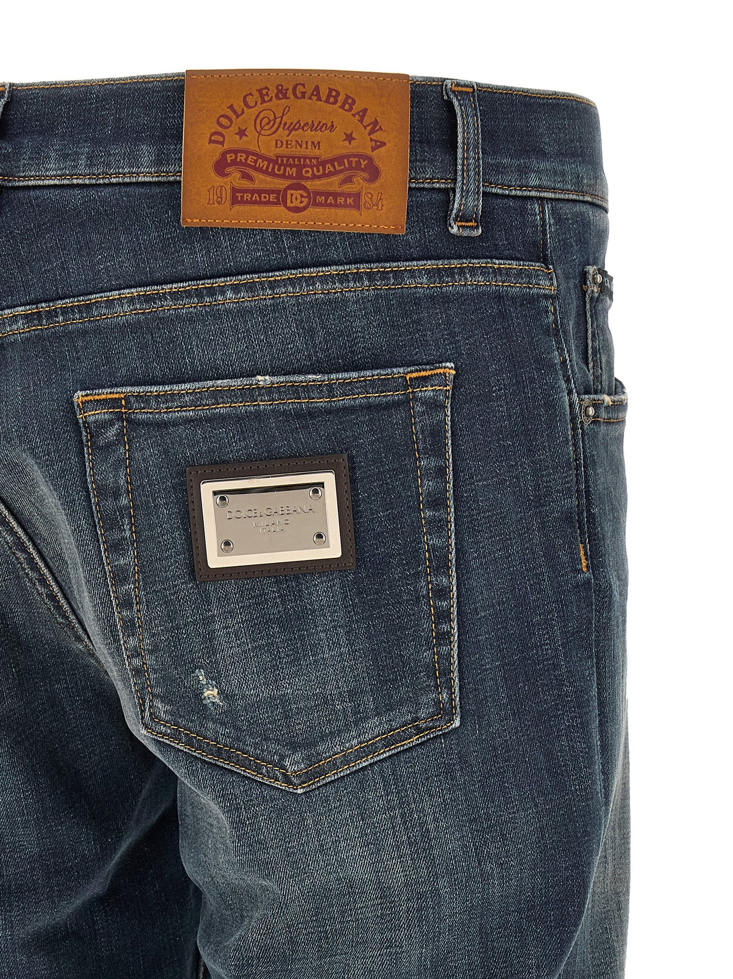 Jeans by Dolce & Gabbana for men in stretch denim cotton blue features a polished silhouette with a polished straight-leg, reaching a polished long and finished with a polished low rise.